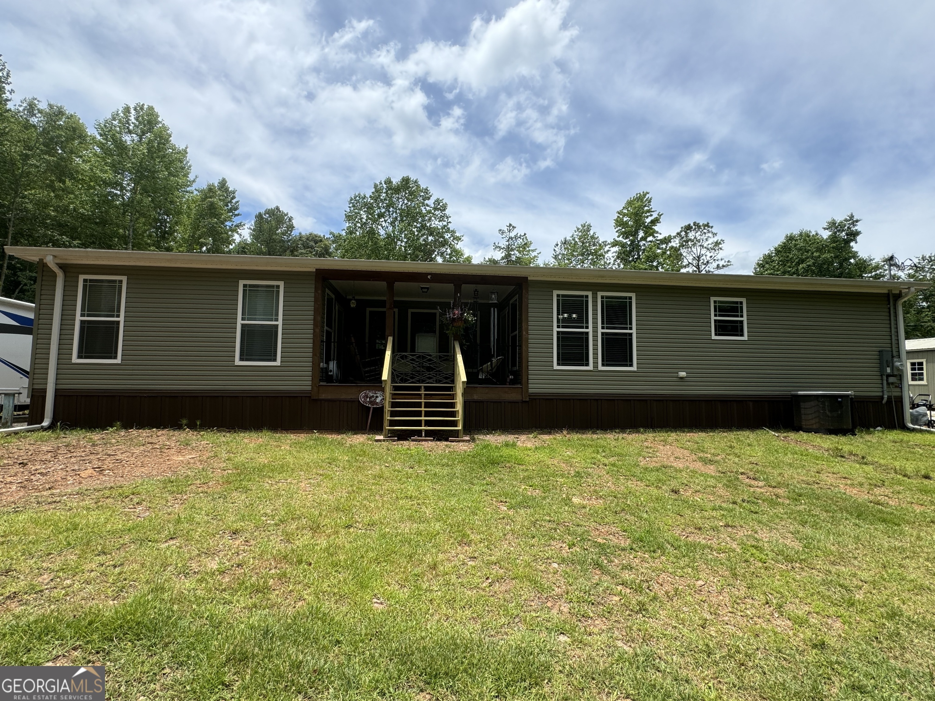 Photo 9 of 19 of 9185 County Rd 56 mobile home