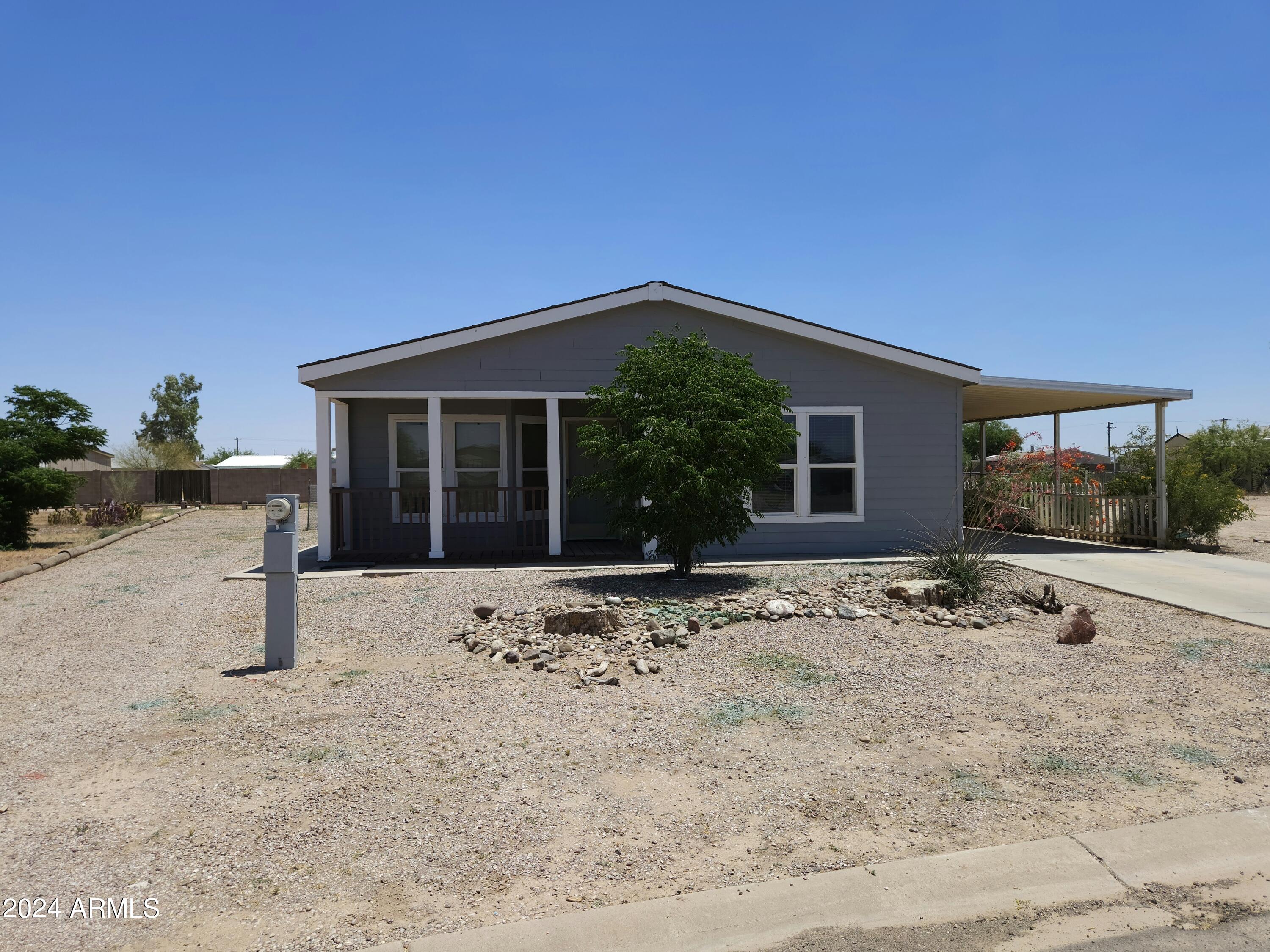 Photo 1 of 21 of 11438 W EUCALYPTUS Drive mobile home