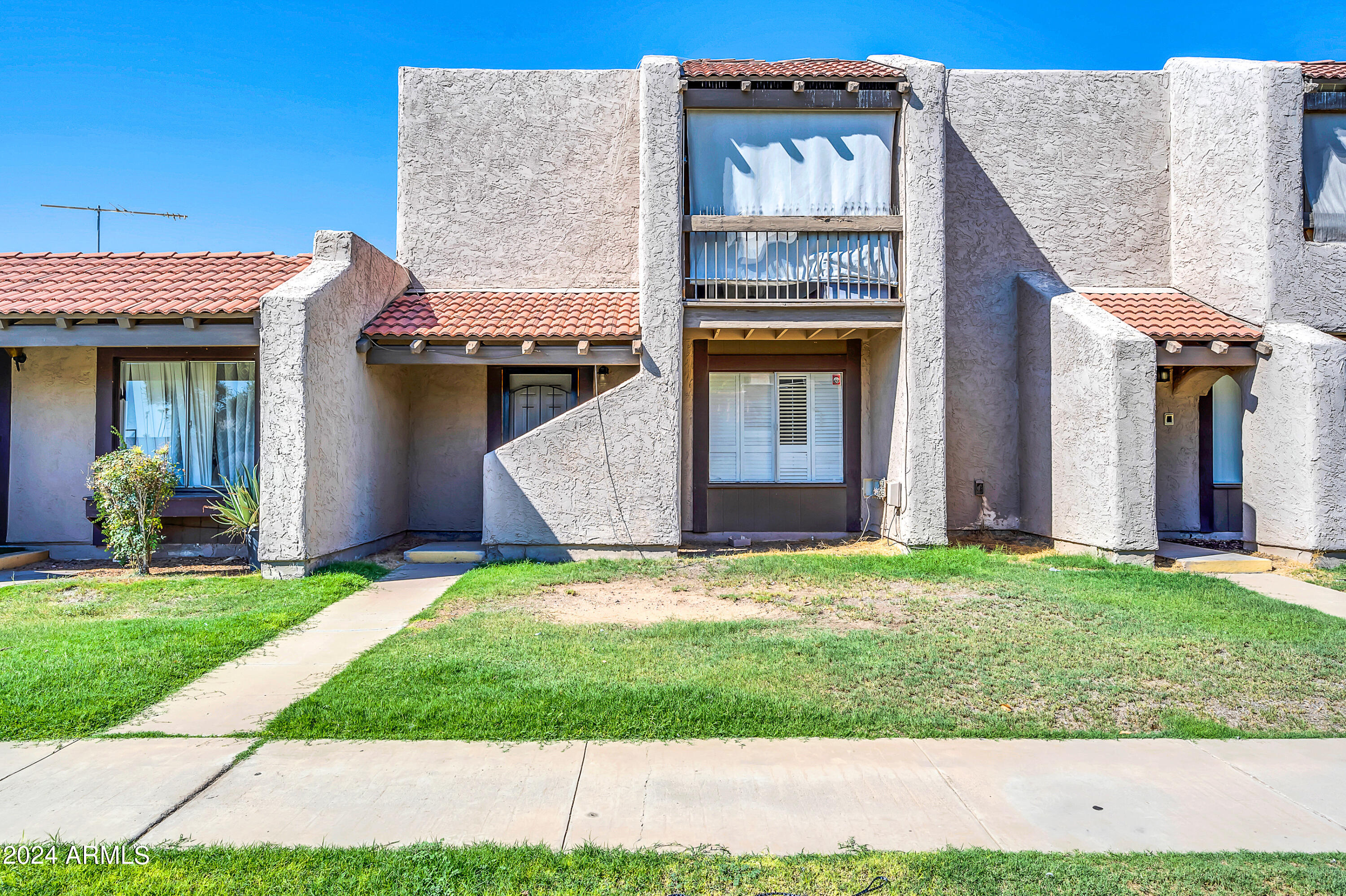 Photo 1 of 24 of 4311 W SOLANO Drive N townhome