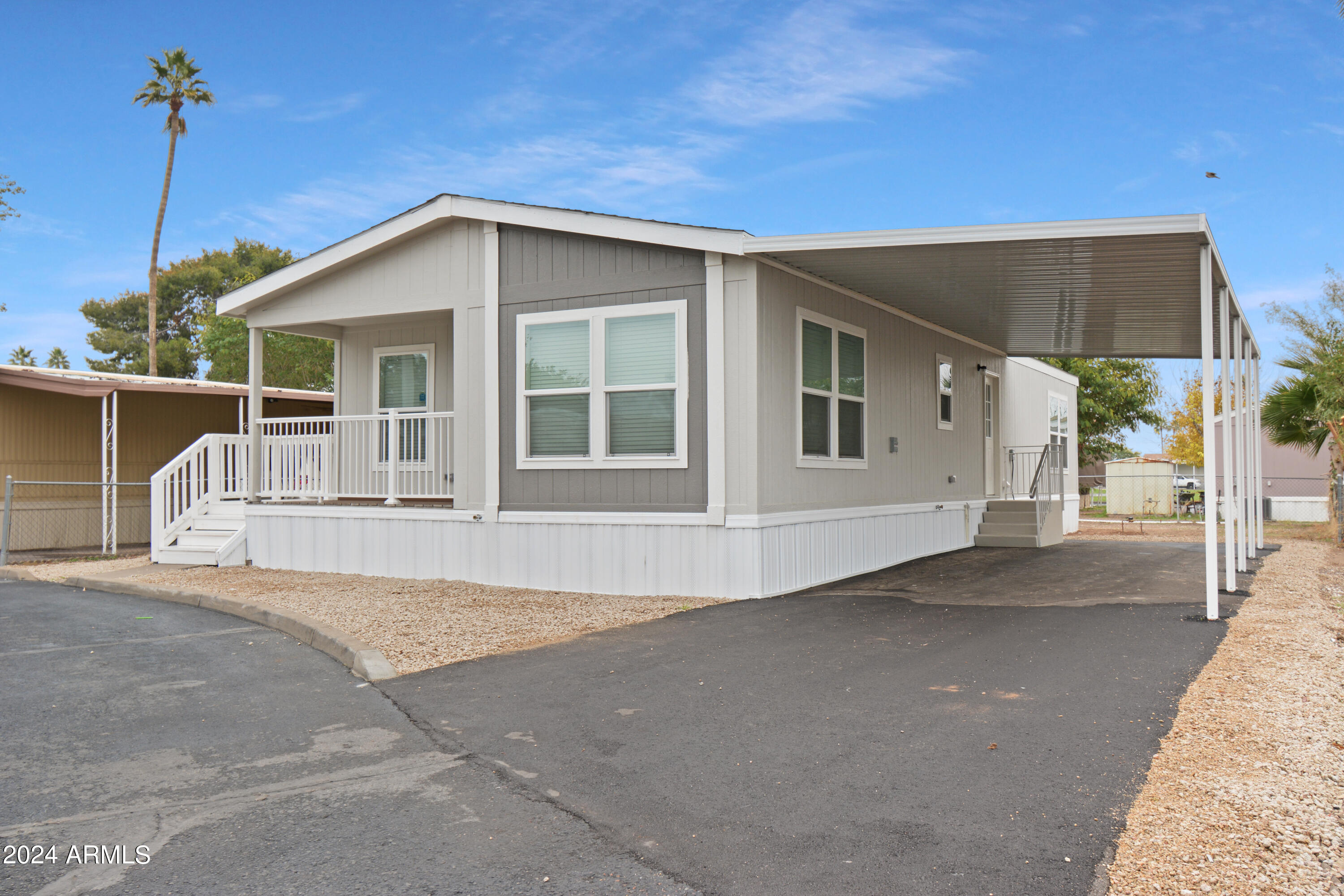 Photo 1 of 25 of 5601 W MISSOURI Avenue 18 mobile home