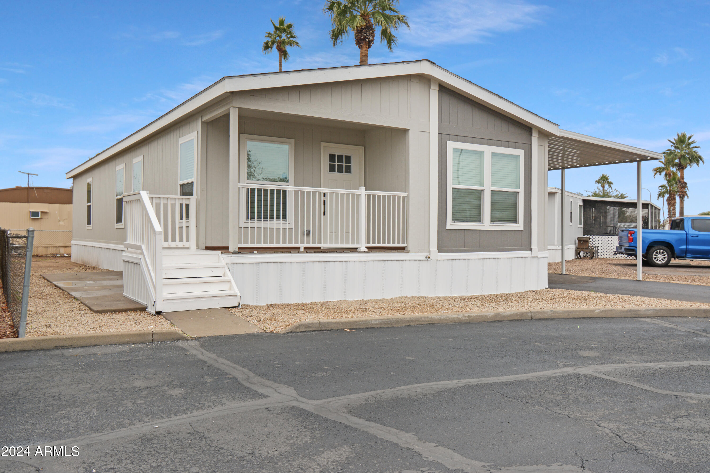 Photo 3 of 25 of 5601 W MISSOURI Avenue 18 mobile home