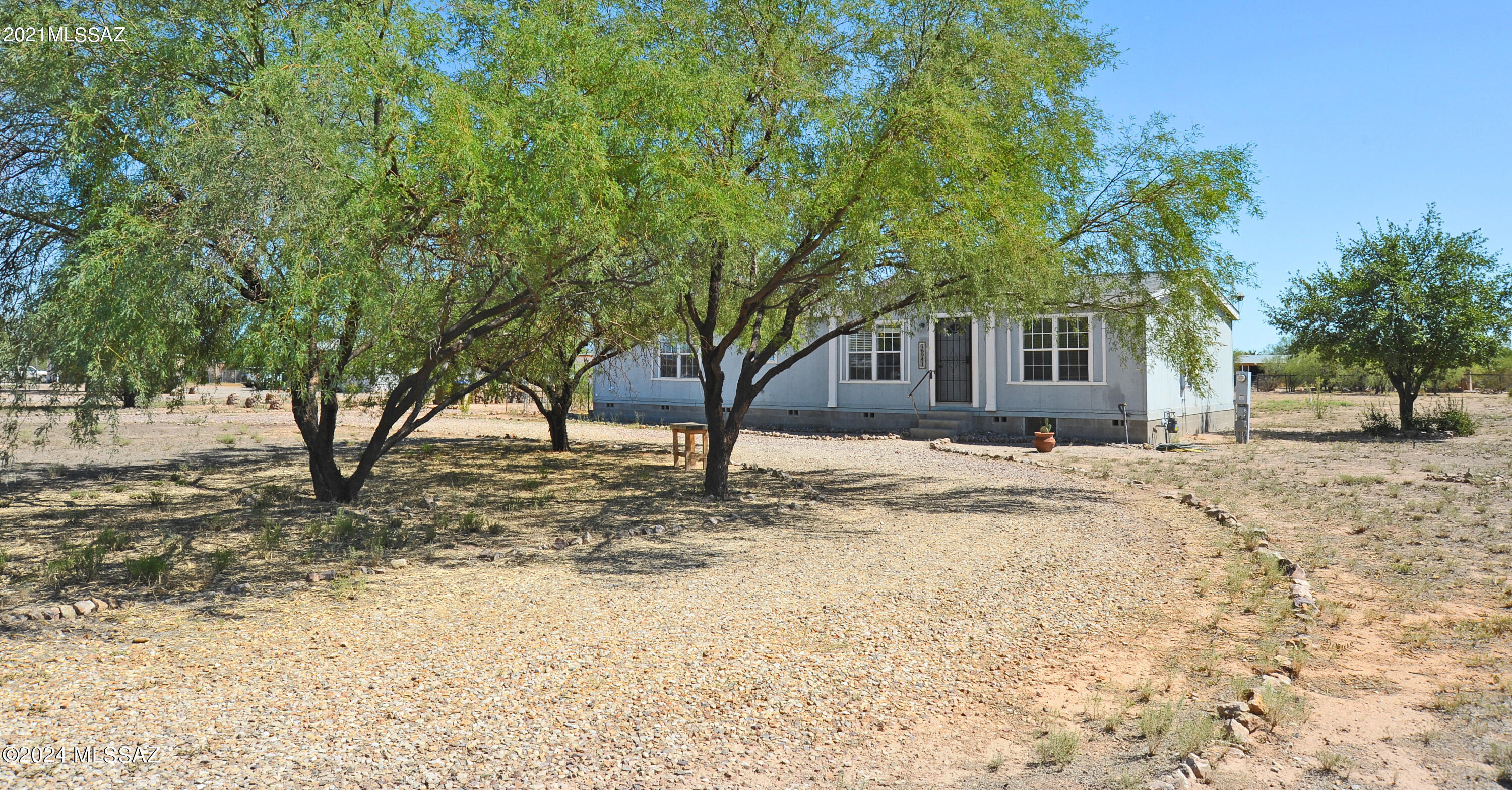 Photo 1 of 37 of 16941 W Whitewing Way mobile home