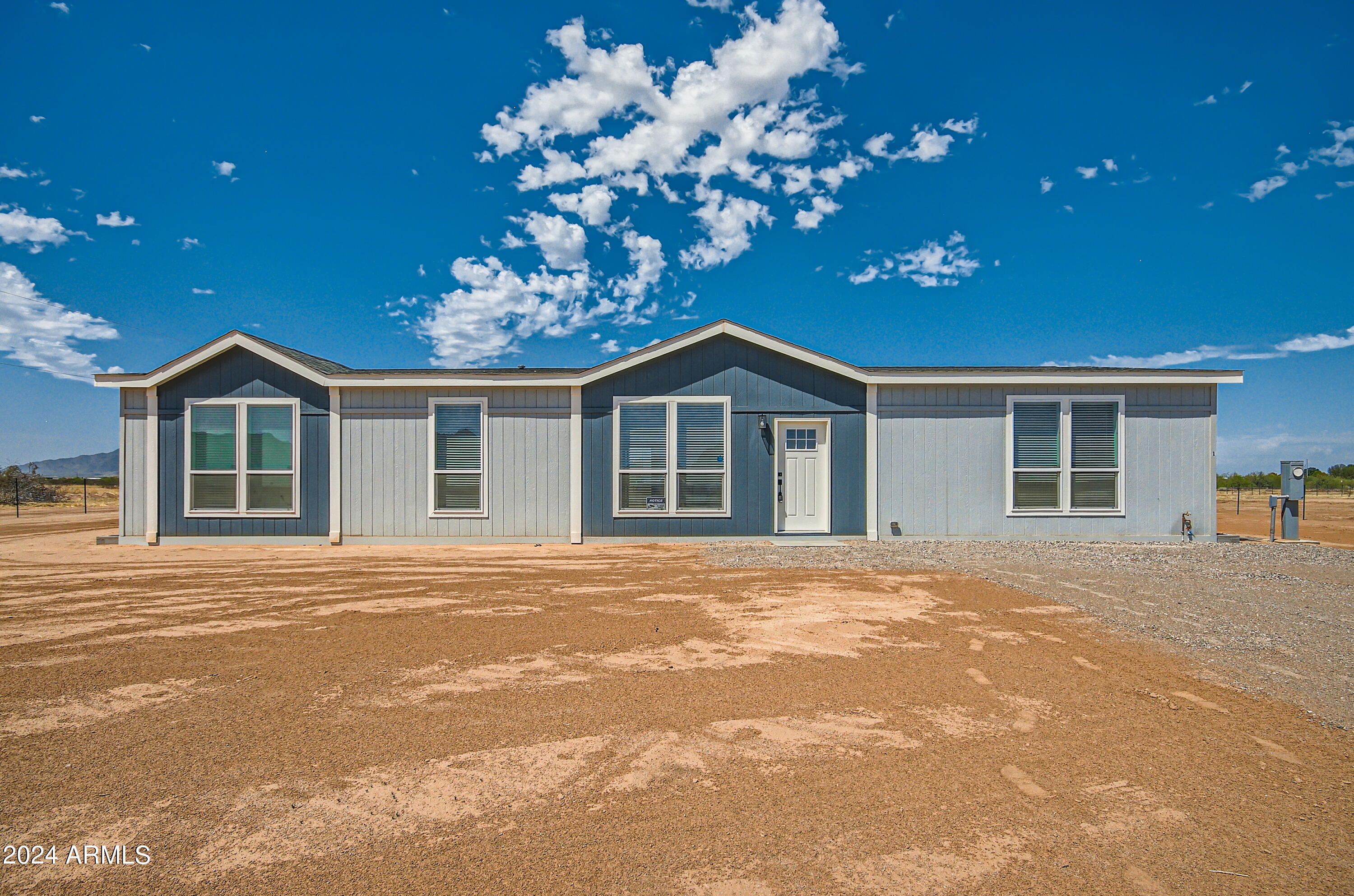 Photo 1 of 28 of 53692 W Footprints Road mobile home