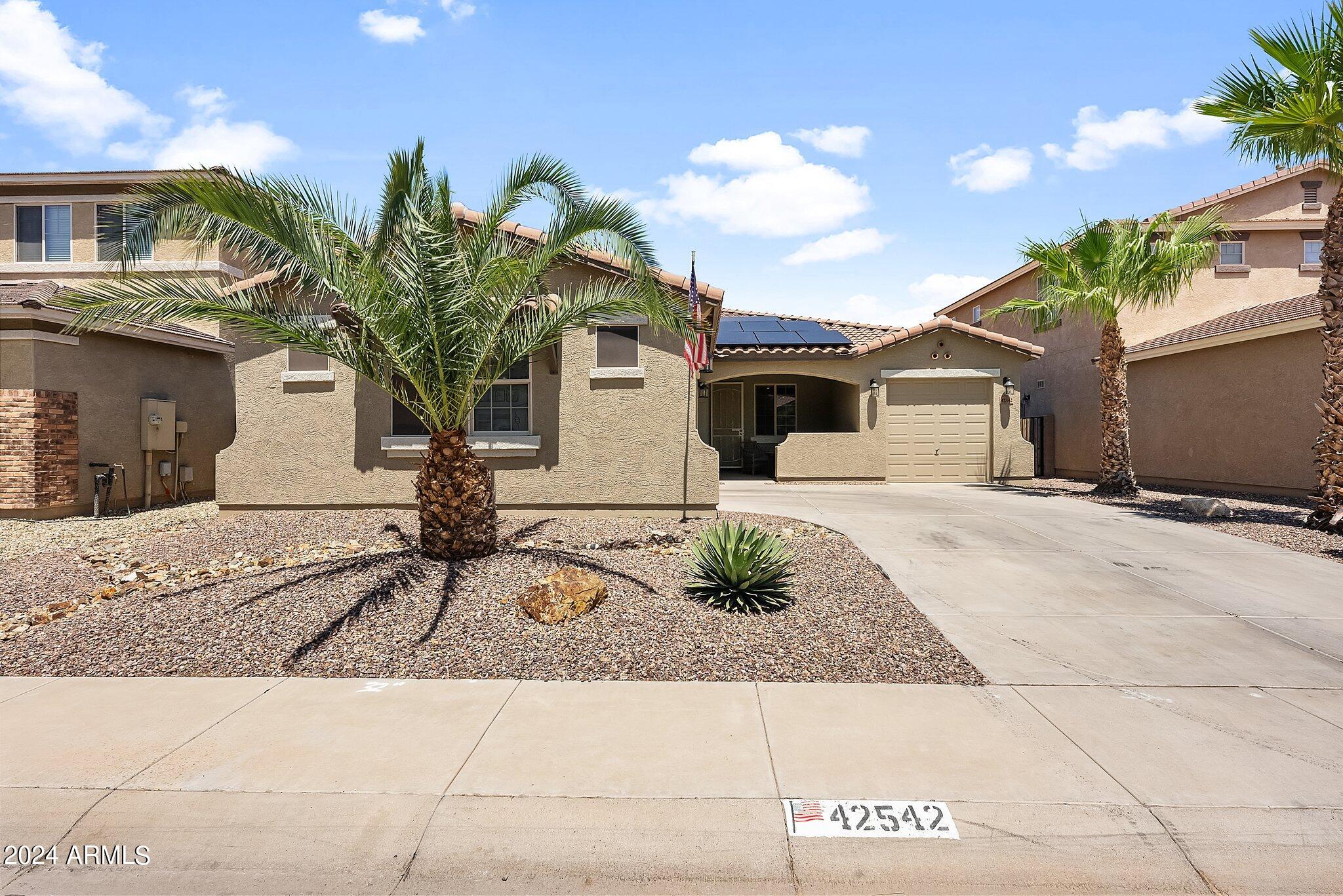 Photo 2 of 38 of 42542 W CHIMAYO Drive house