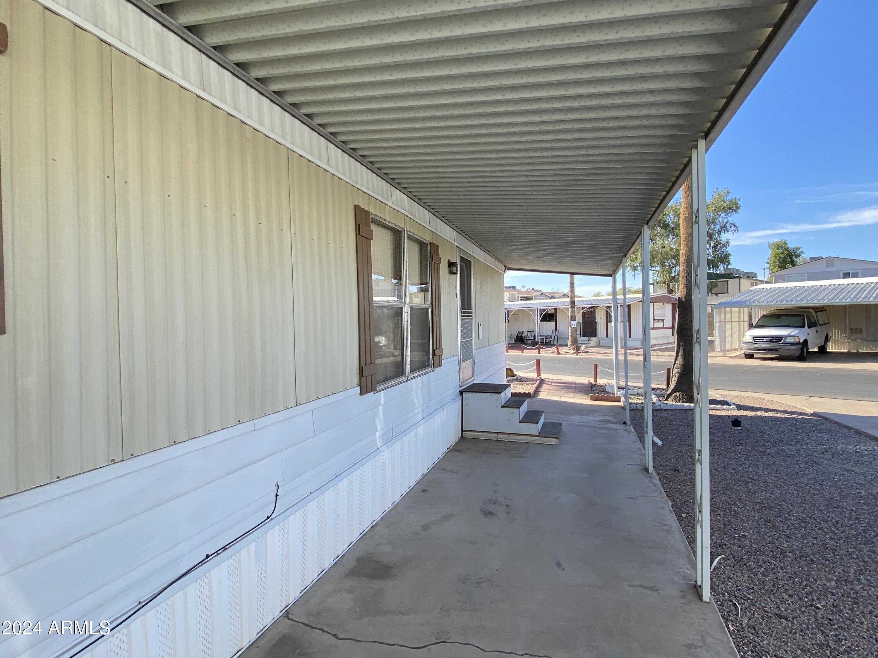 Photo 4 of 32 of 318 S CRISMON Road 86 mobile home