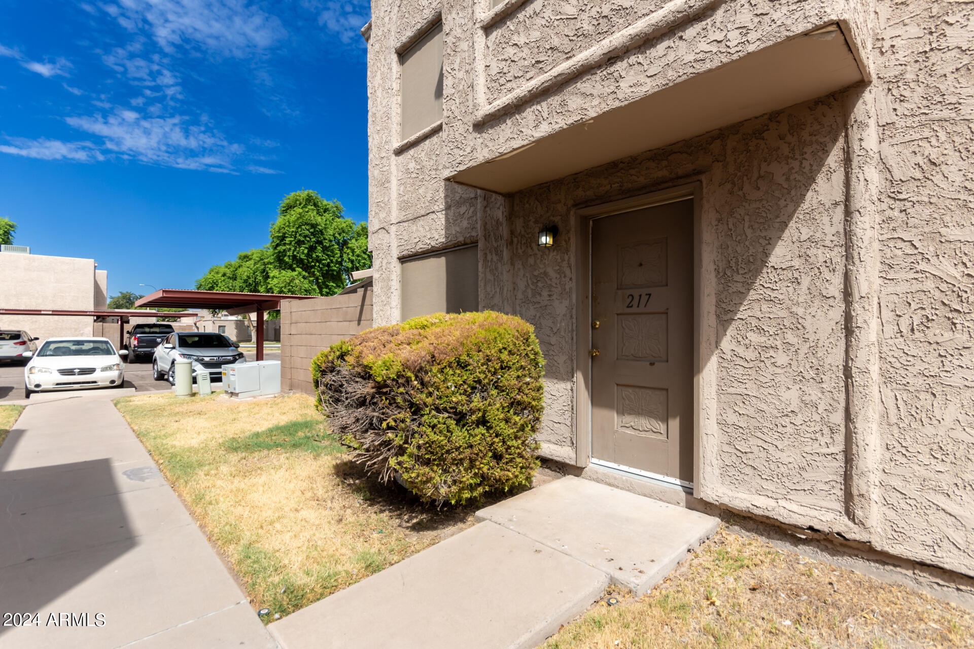 Photo 2 of 26 of 600 S DOBSON Road 217 townhome