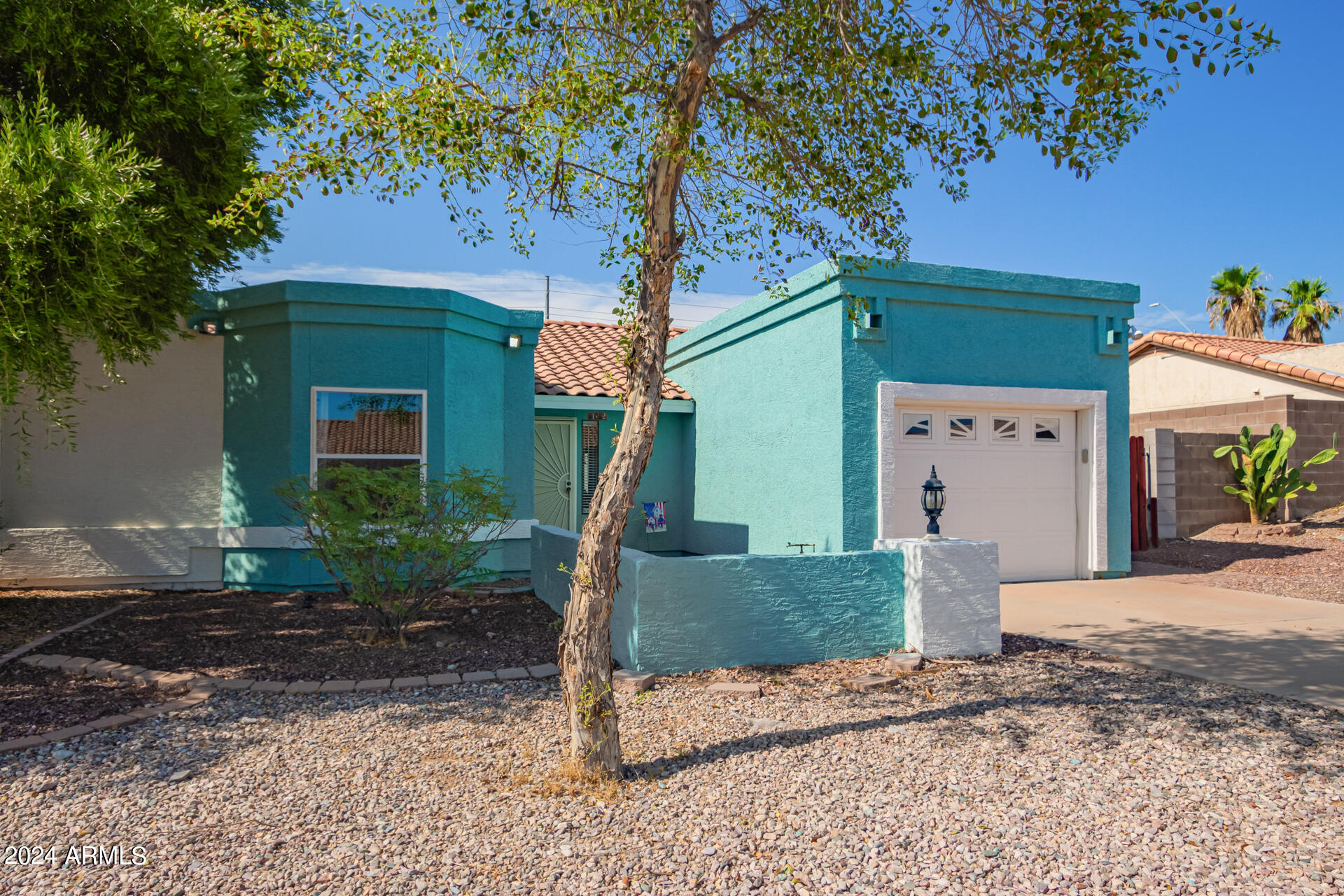 Photo 1 of 25 of 11412 W PUGET Avenue townhome