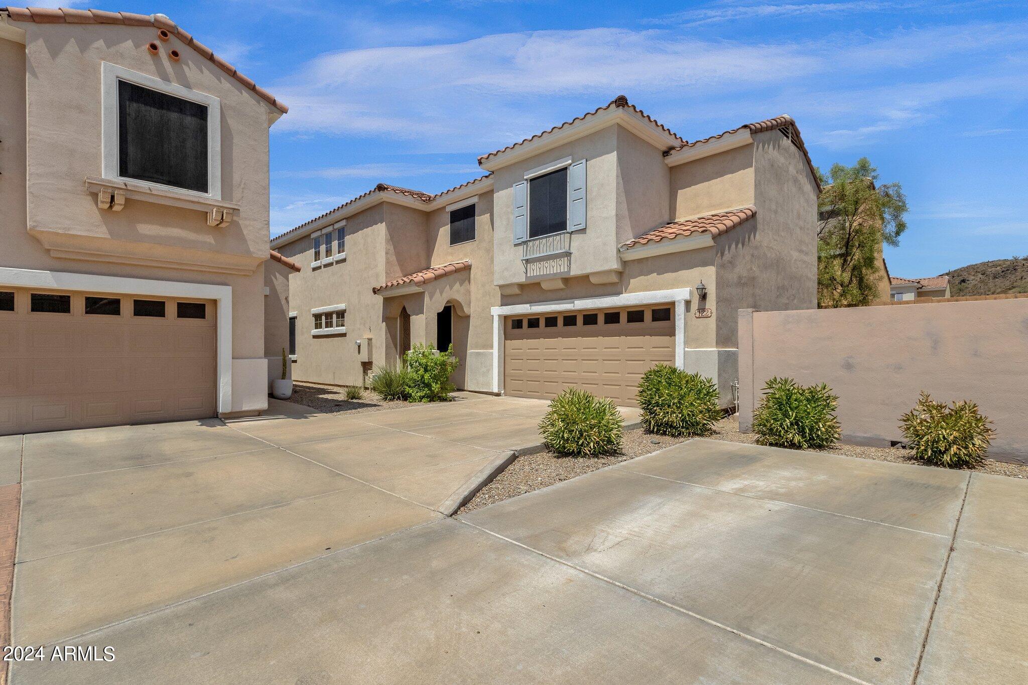 Photo 2 of 41 of 122 W MOUNTAIN SAGE Drive house