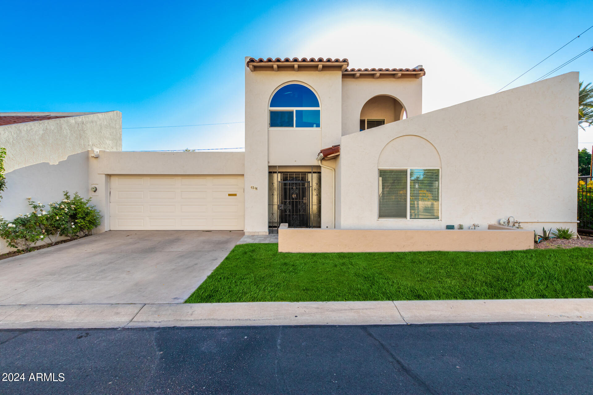 Photo 1 of 23 of 6346 N 14TH Street townhome