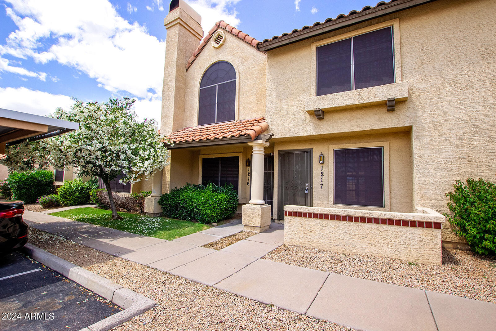 Photo 2 of 28 of 5704 E AIRE LIBRE Avenue 1217 townhome