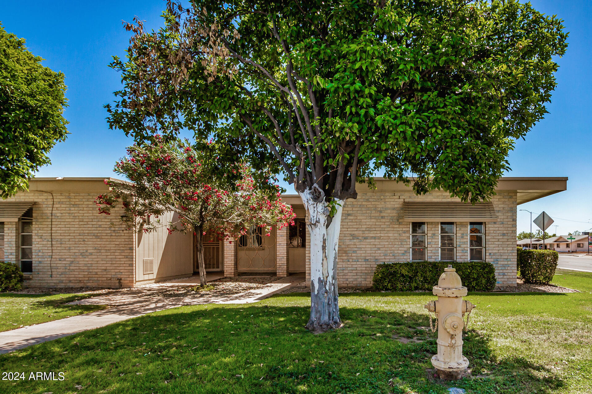 Photo 1 of 38 of 11095 W COGGINS Drive townhome