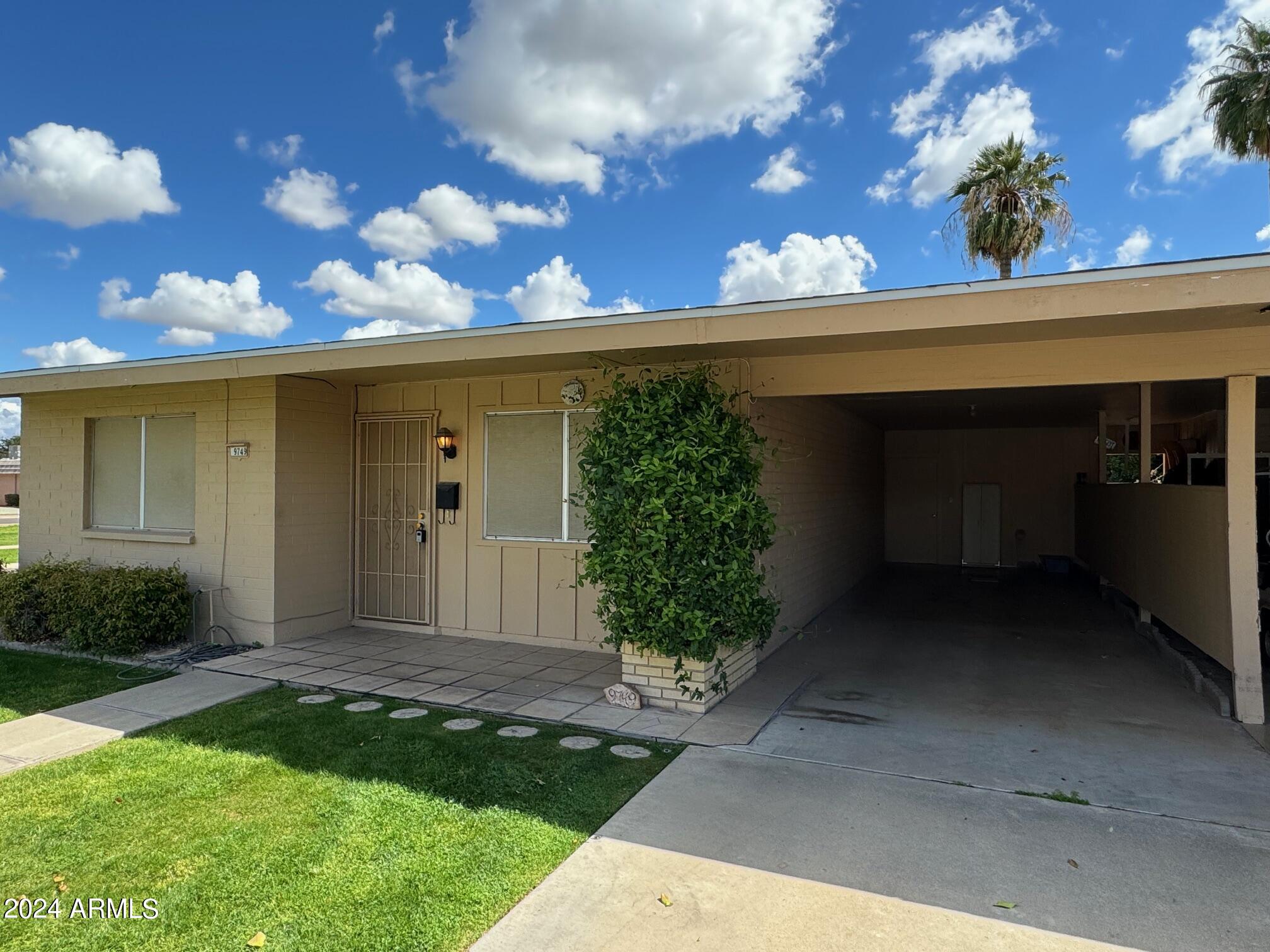 Photo 1 of 21 of 9749 N 105TH Drive townhome