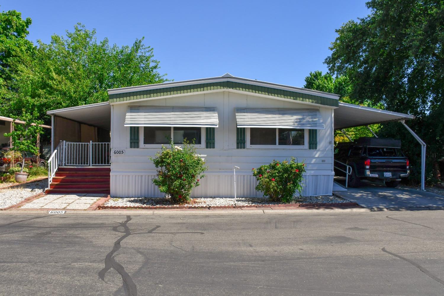 Photo 1 of 96 of 6005 Cackler Lane 55 mobile home