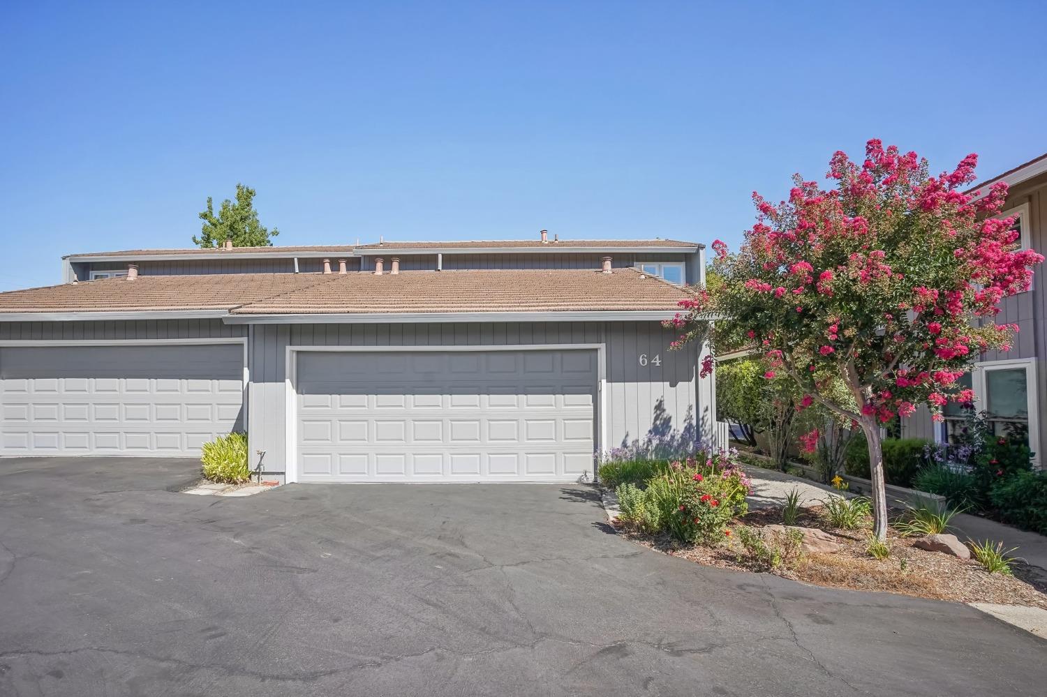 Photo 1 of 33 of 64 Rolling Green Circle townhome