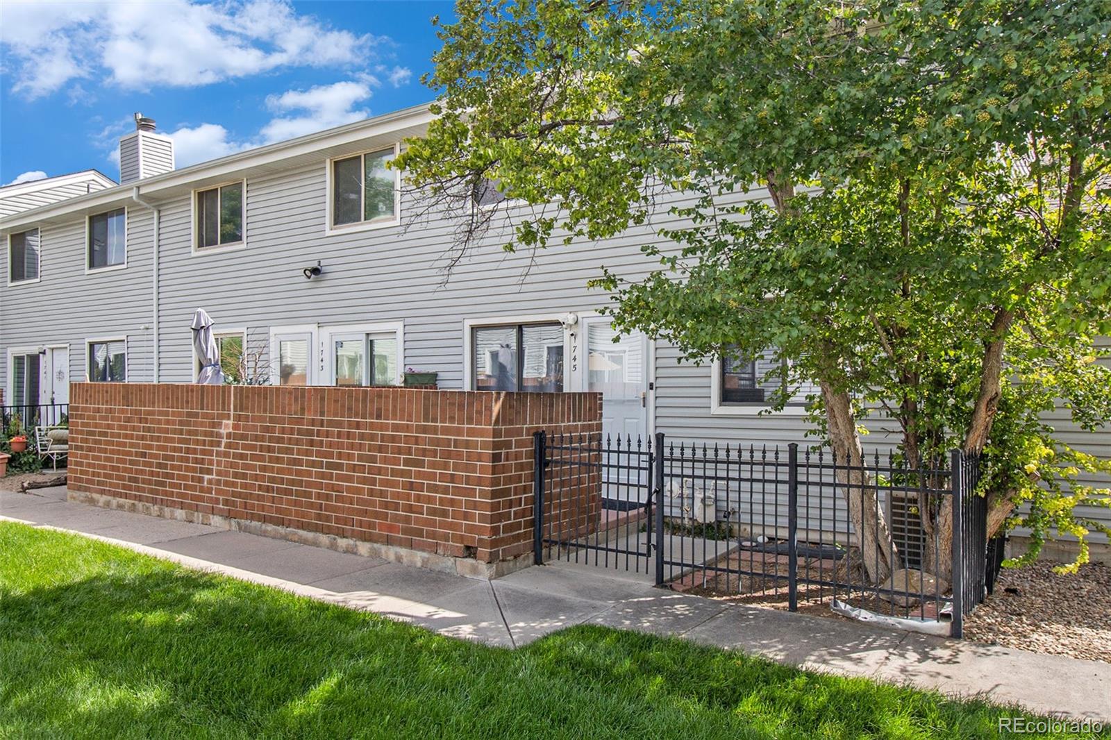 Photo 1 of 21 of 1745 W 102nd Avenue townhome