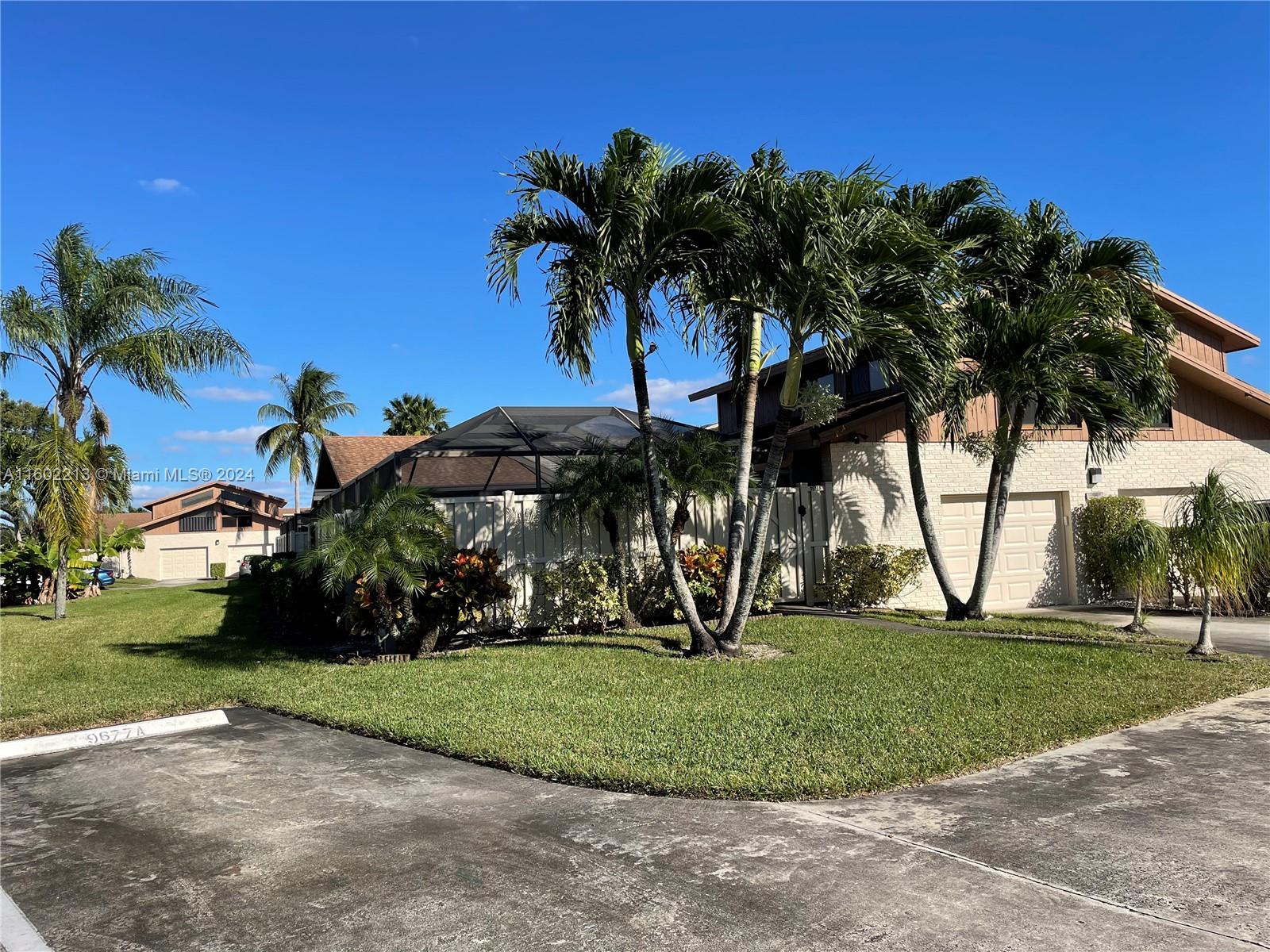 Photo 2 of 20 of 9677 Boca Gardens Pkwy A townhome