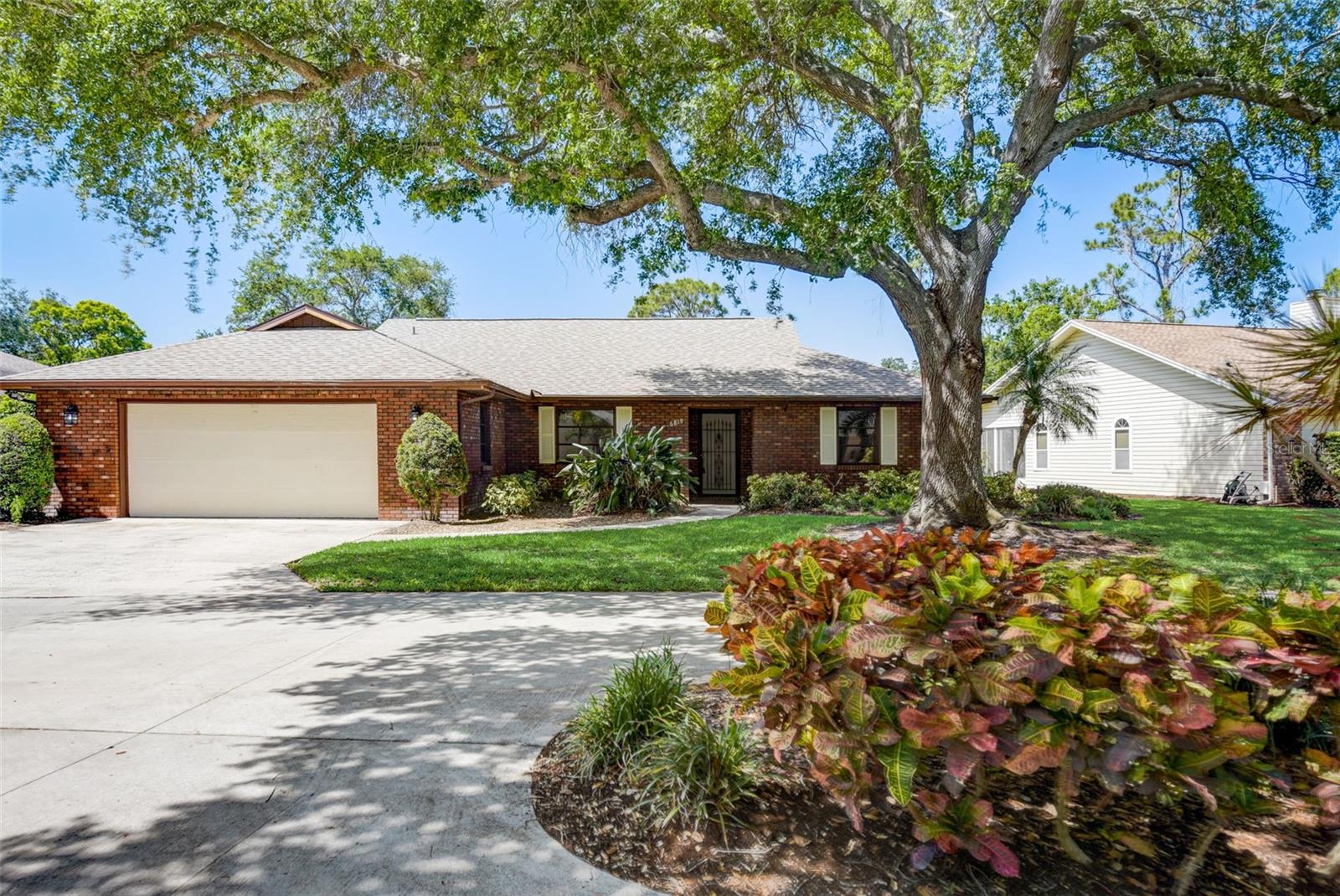 Photo 1 of 42 of 6819 ARBOR OAKS CIRCLE house