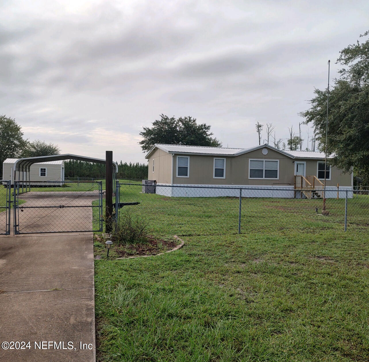 Photo 1 of 1 of 11037 COUNTY ROAD 121 mobile home