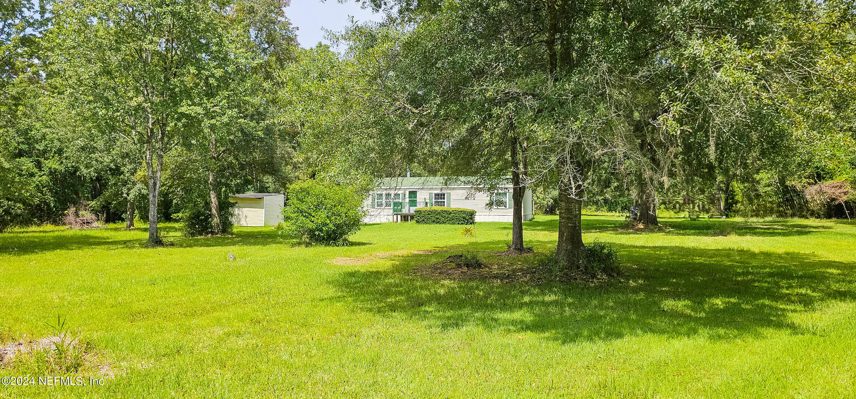 Photo 2 of 19 of 44170 WOODLAND Circle mobile home