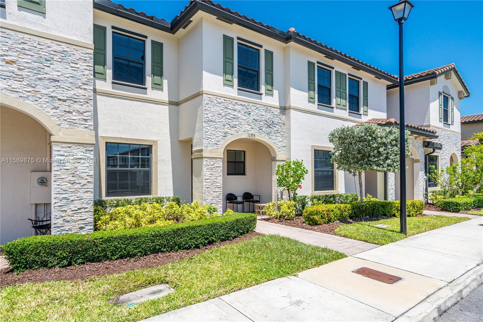 Photo 1 of 21 of 11375 SW 250th Ter townhome