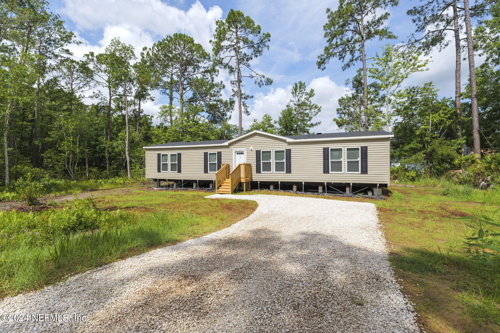 Photo 1 of 28 of 10918 W PINE ESTATES Road mobile home