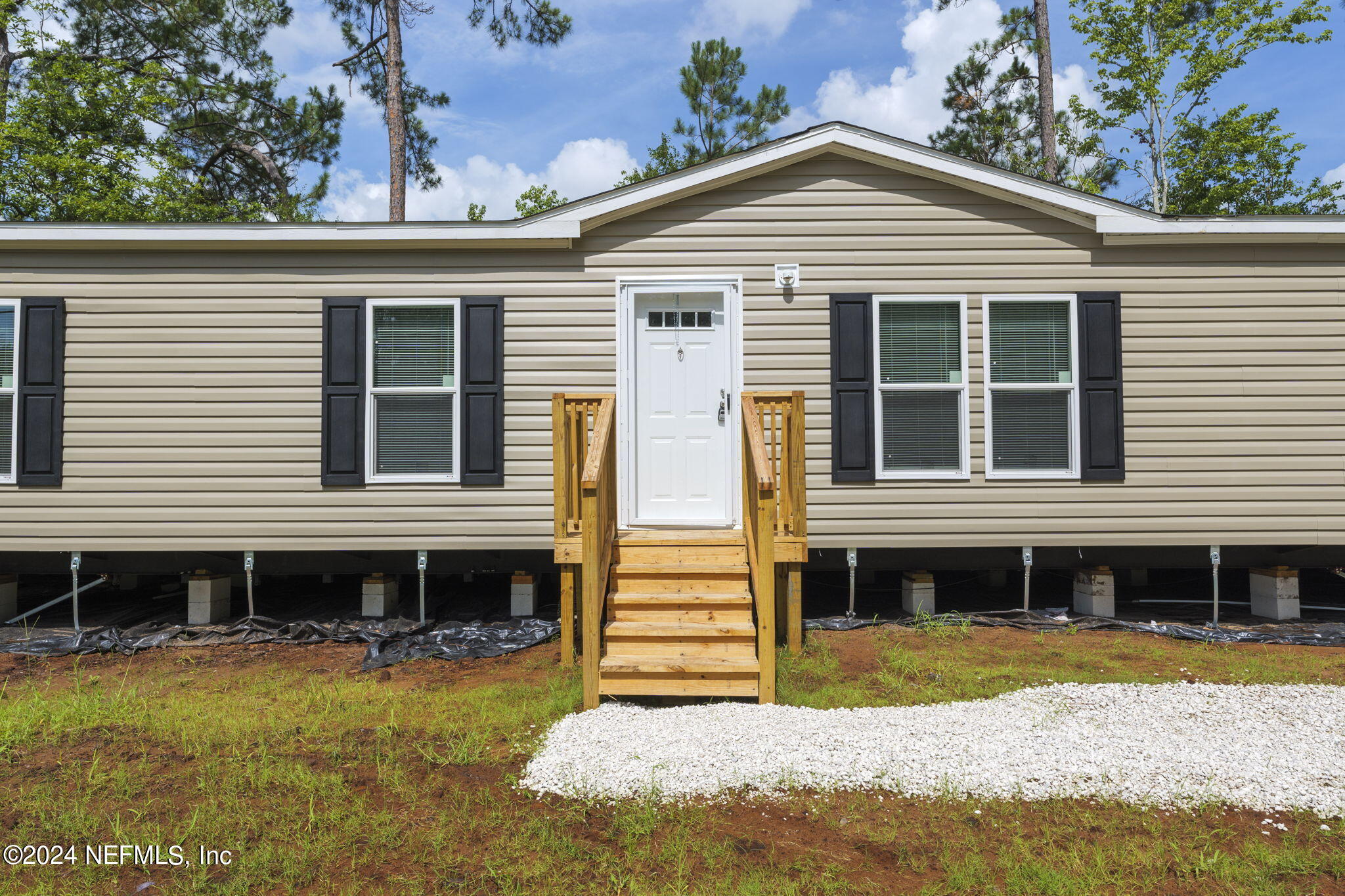 Photo 2 of 28 of 10918 W PINE ESTATES Road mobile home