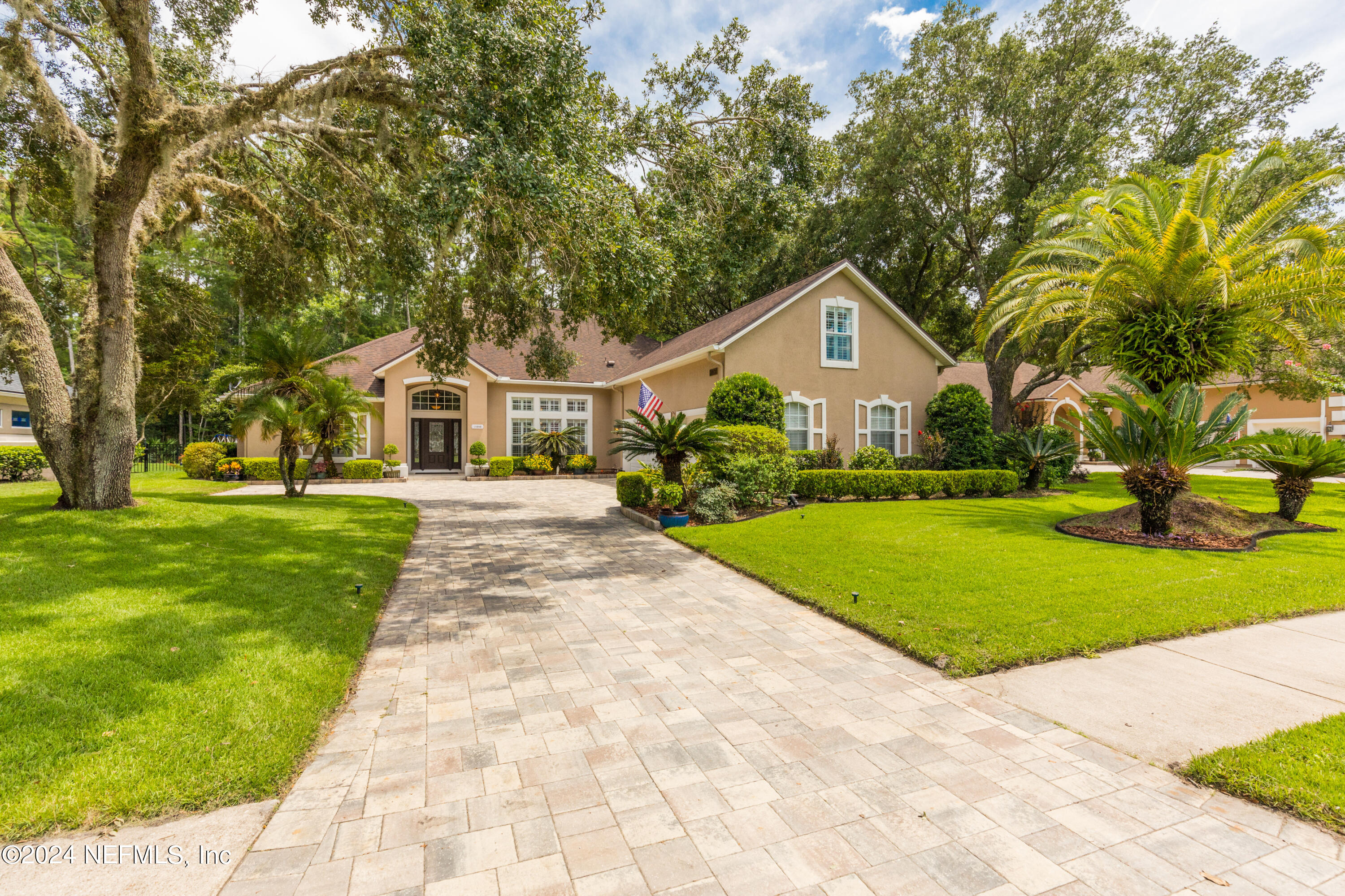 Photo 1 of 64 of 10393 CYPRESS LAKES Drive house