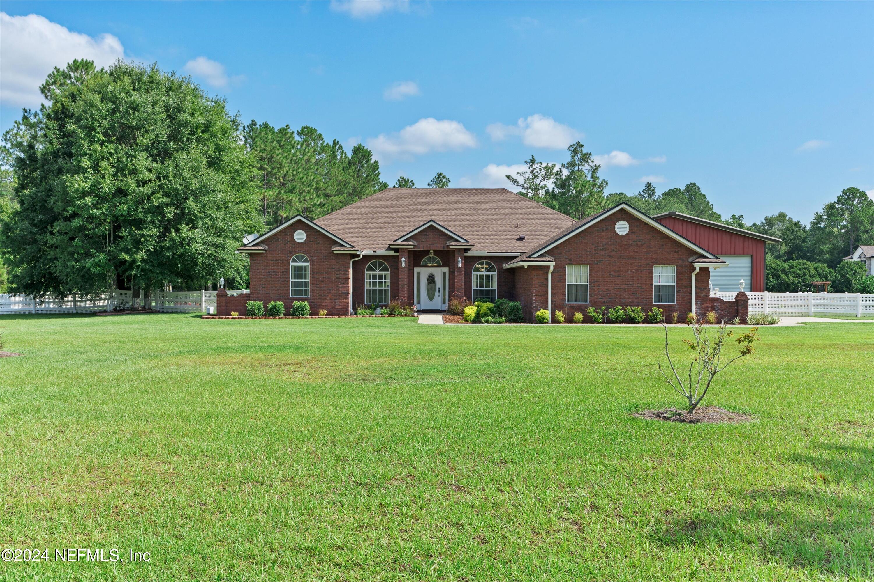 Photo 1 of 36 of 10349 FLORA SPRINGS Road S house