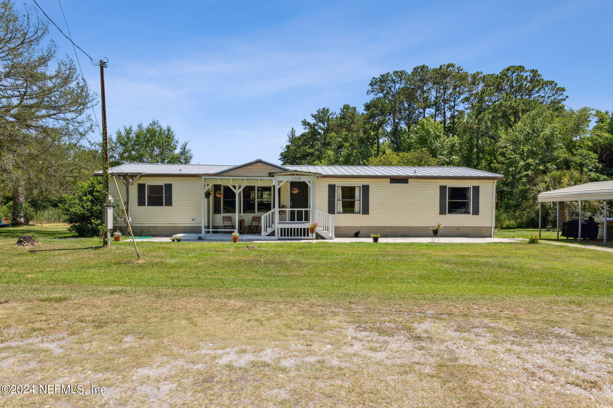 Photo 1 of 46 of 1338 DUVAL LAKE Road N mobile home