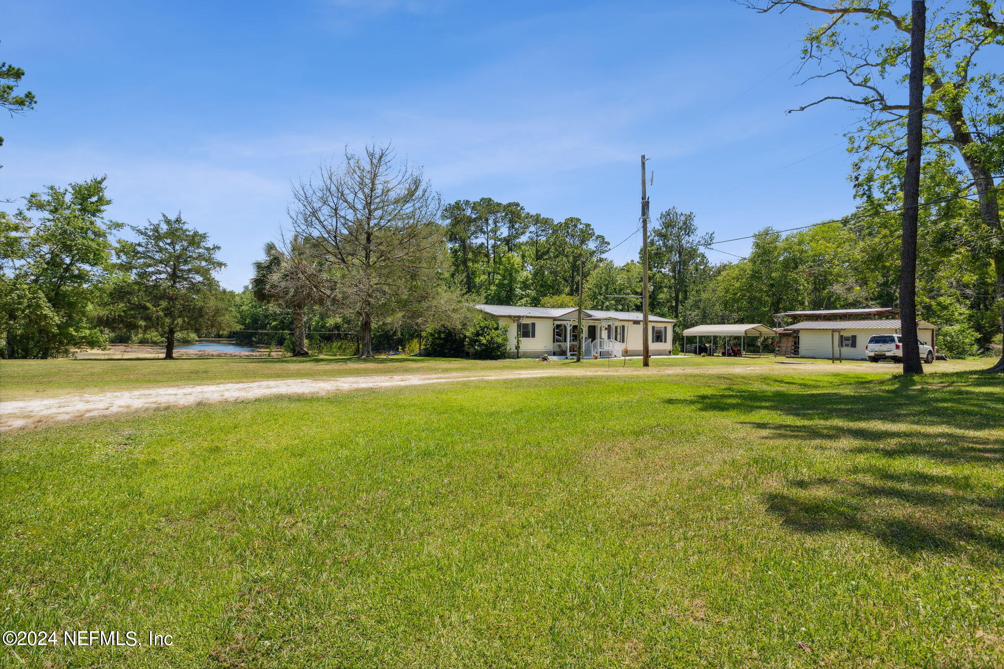 Photo 2 of 46 of 1338 DUVAL LAKE Road N mobile home