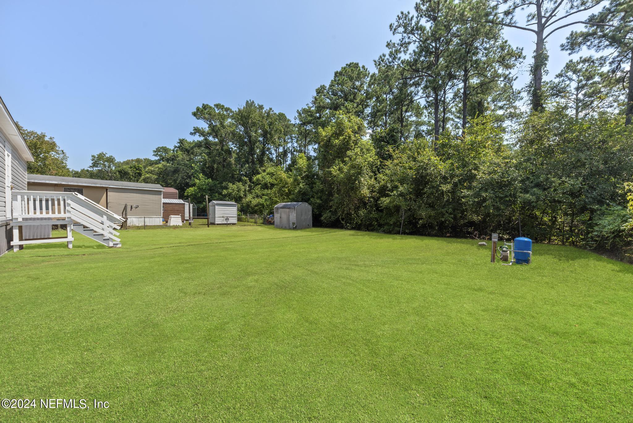 Photo 5 of 33 of 12835 DUVAL LAKE Road E mobile home