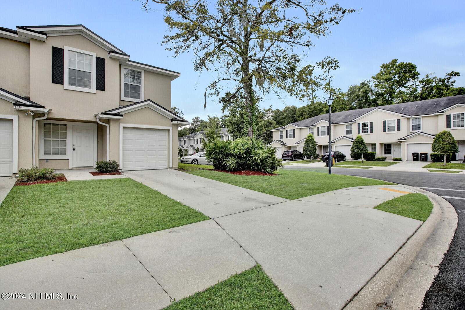 Photo 1 of 21 of 6510 TIMMERMAN Court N townhome