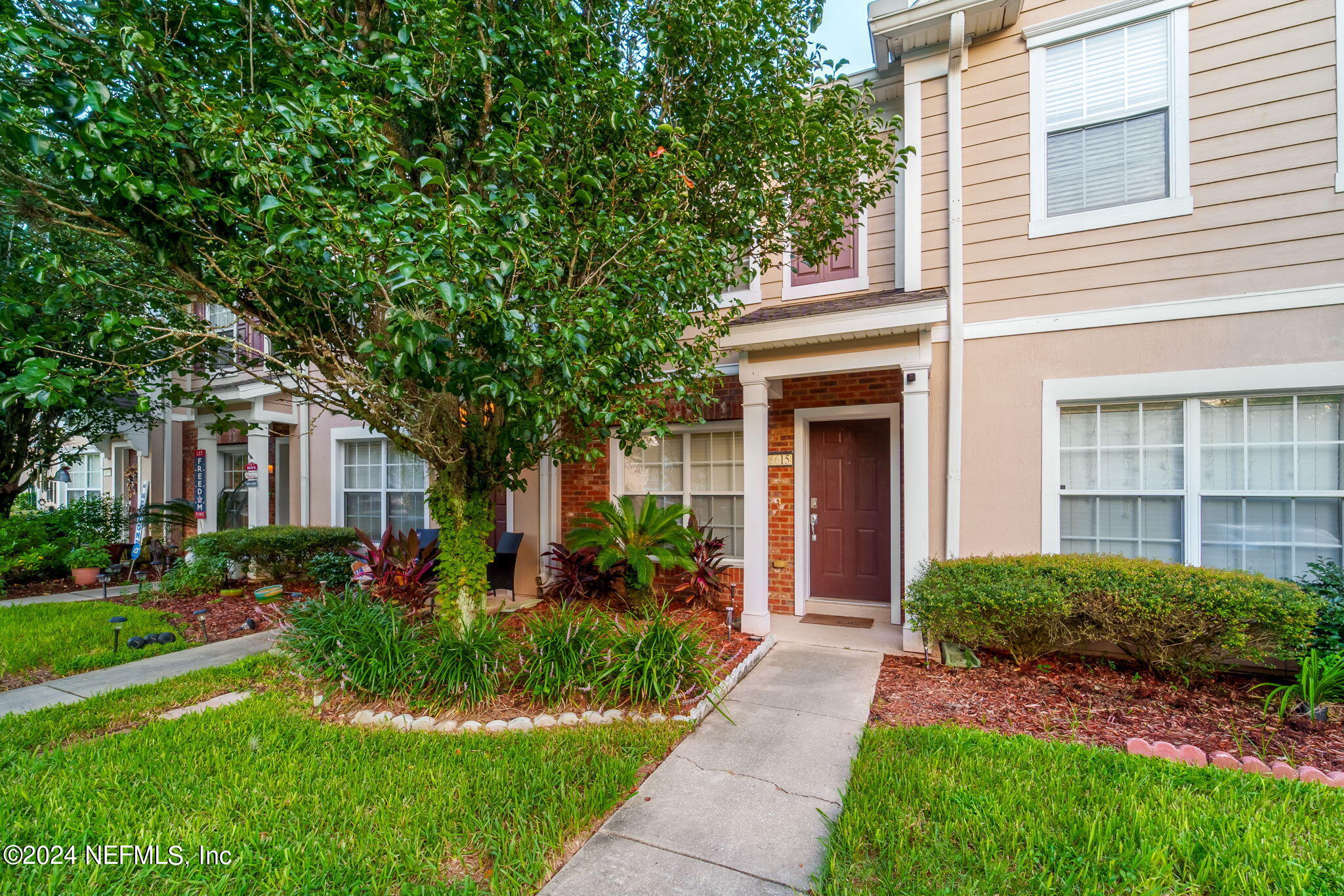 Photo 2 of 36 of 6615 ARCHING BRANCH Circle townhome