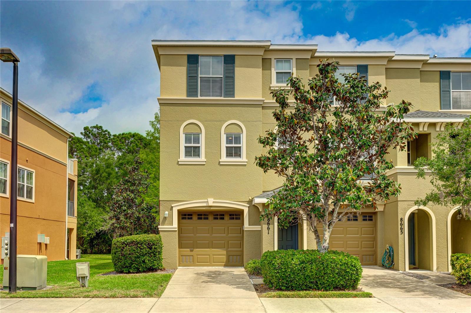 Photo 2 of 27 of 8661 MAJESTIC ELM COURT townhome