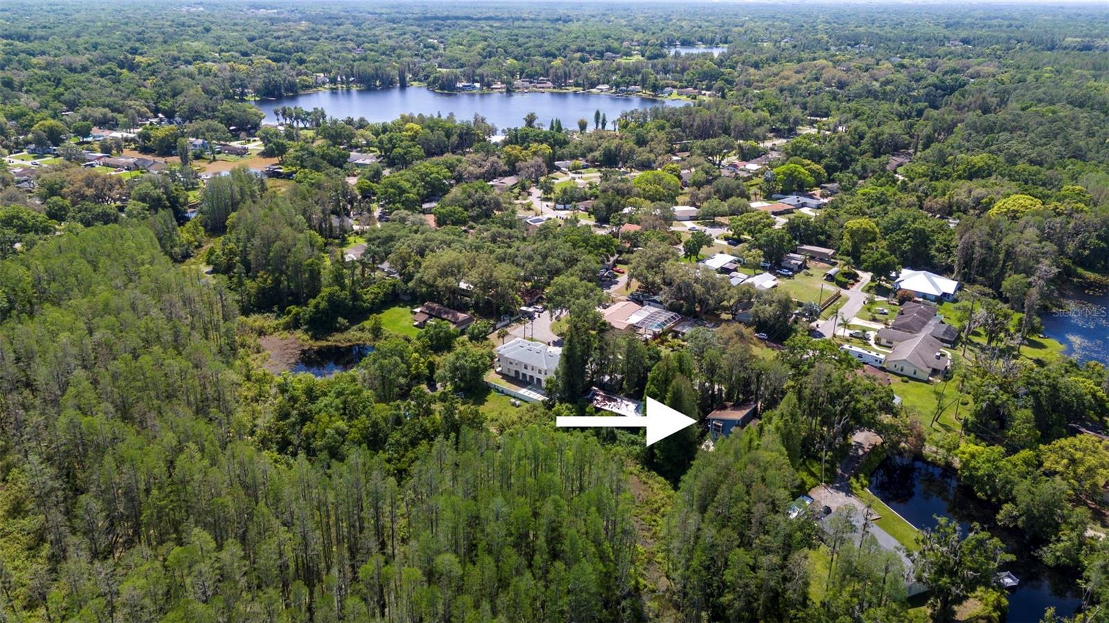 Photo 62 of 96 of 18716 LAKE COMMISTON DRIVE house