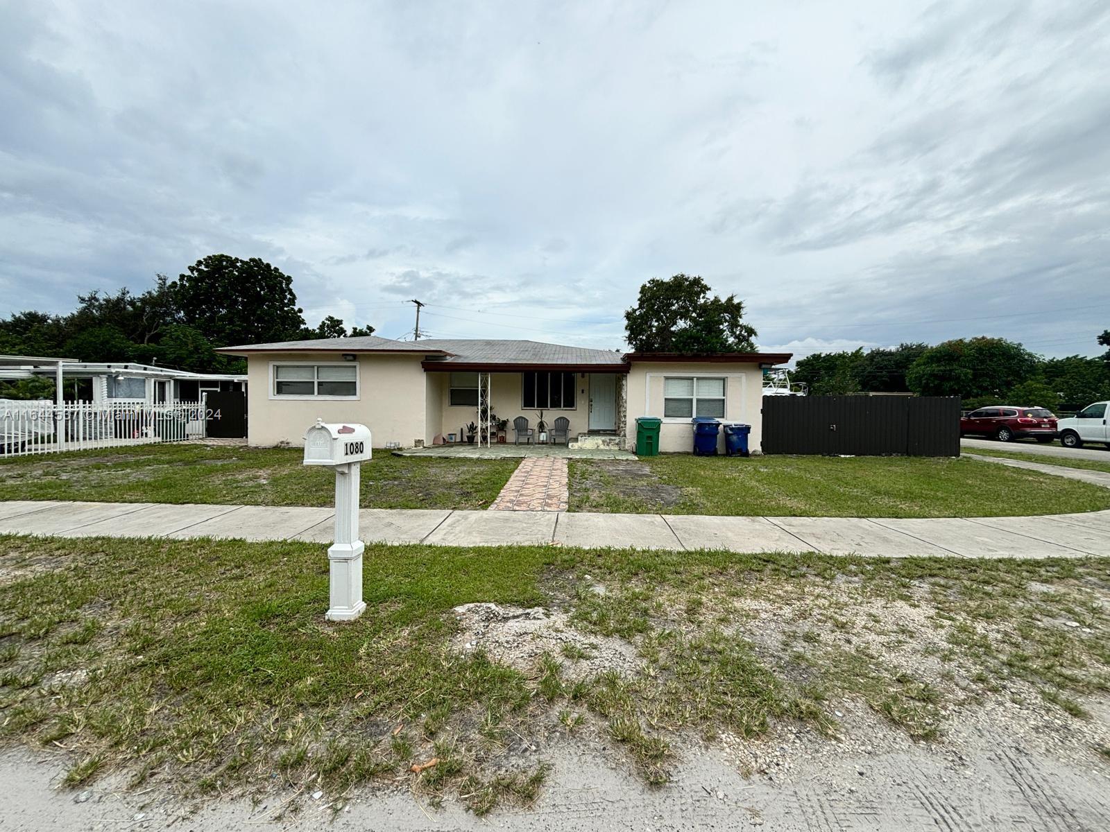 Photo 1 of 24 of 1080 NW 140th St house