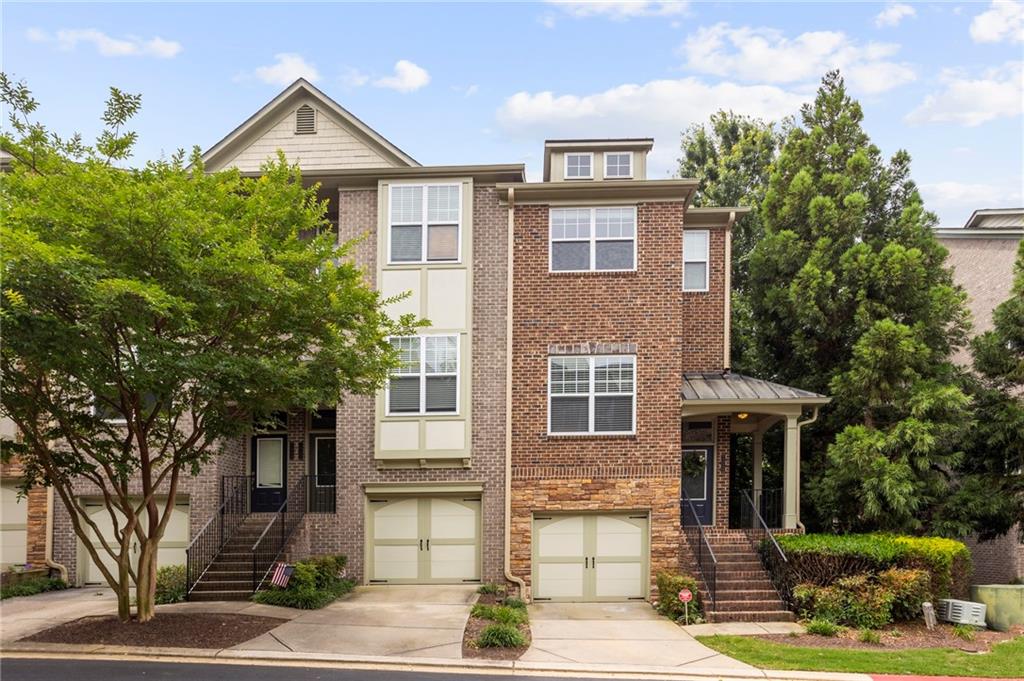 Photo 2 of 36 of 2024 Cobblestone Circle NE townhome