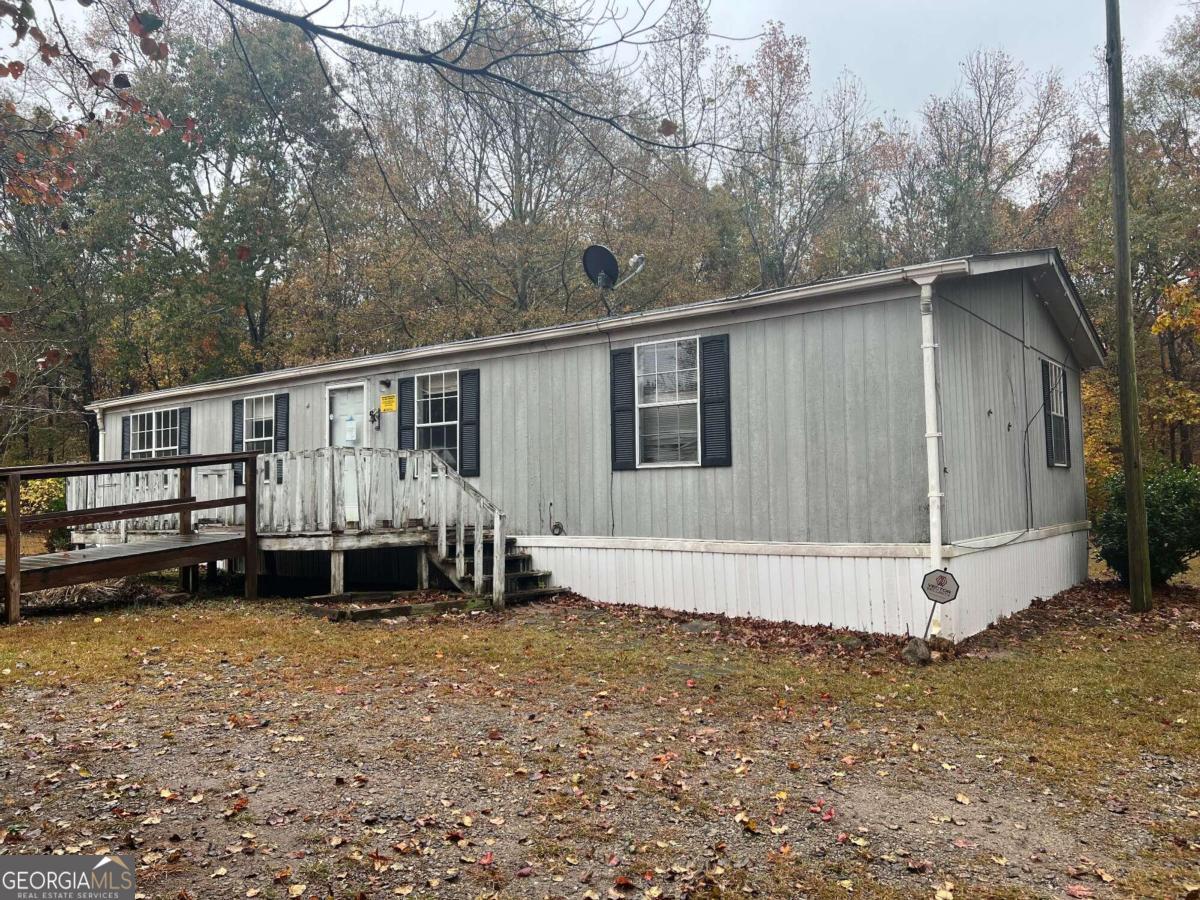 Photo 2 of 15 of 299 Swamp Guinea RD mobile home