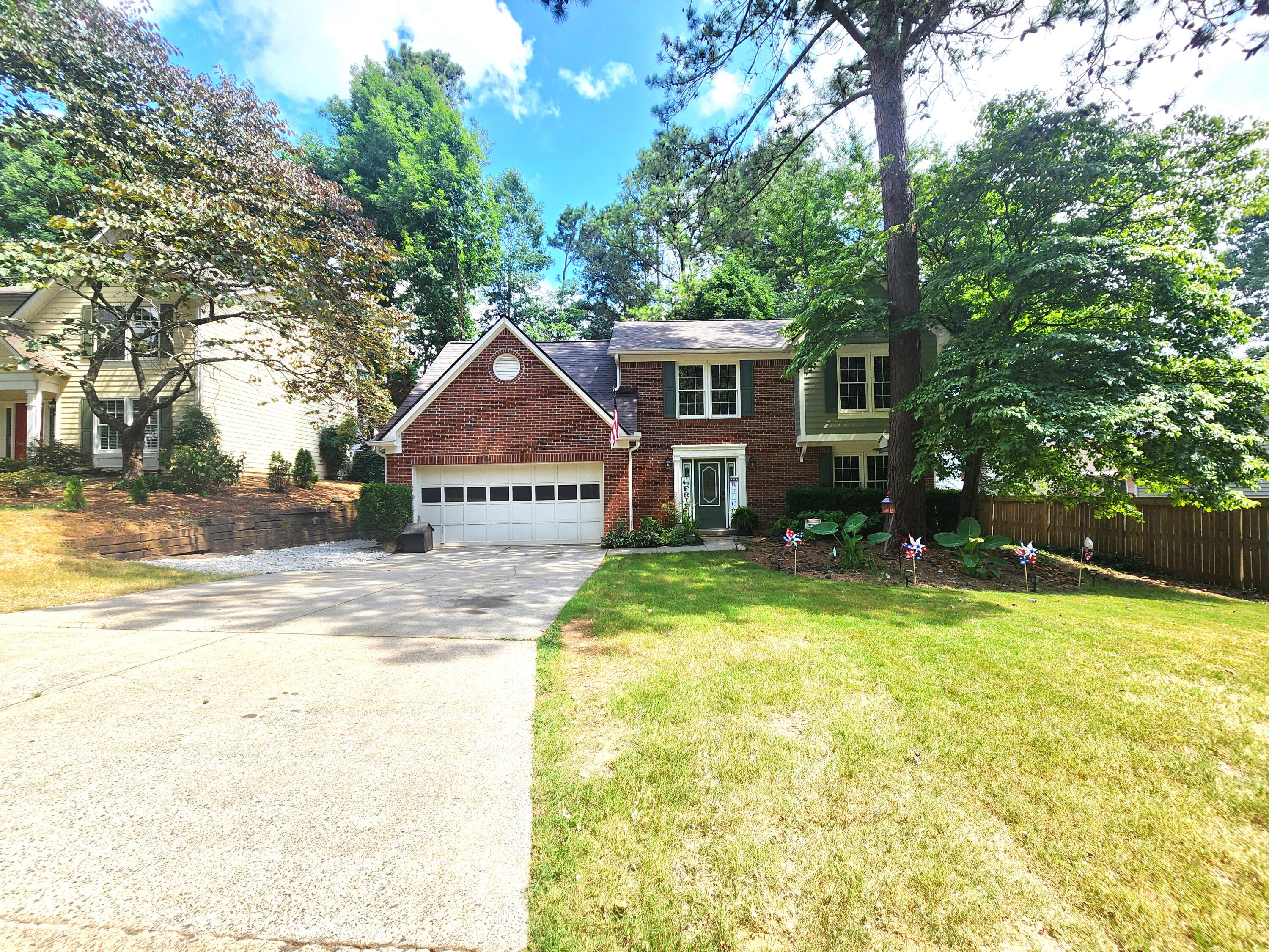 Photo 1 of 45 of 1207 NW Rockmart Cir house