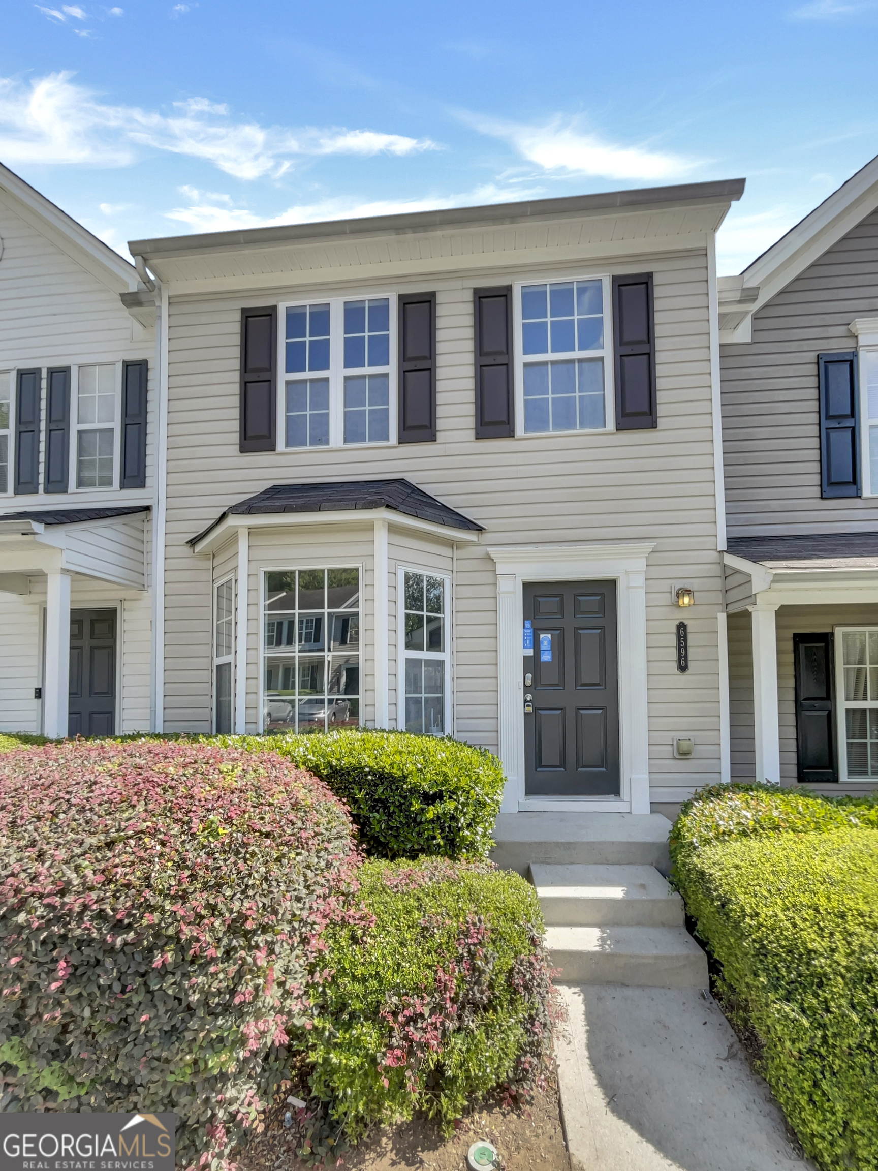 Photo 1 of 23 of 6596 Arbor Gate DR SW UNIT #7 townhome