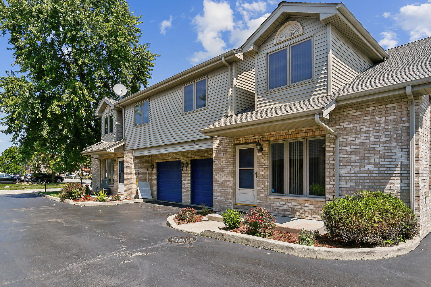 Photo 1 of 15 of 7047 100th Street townhome