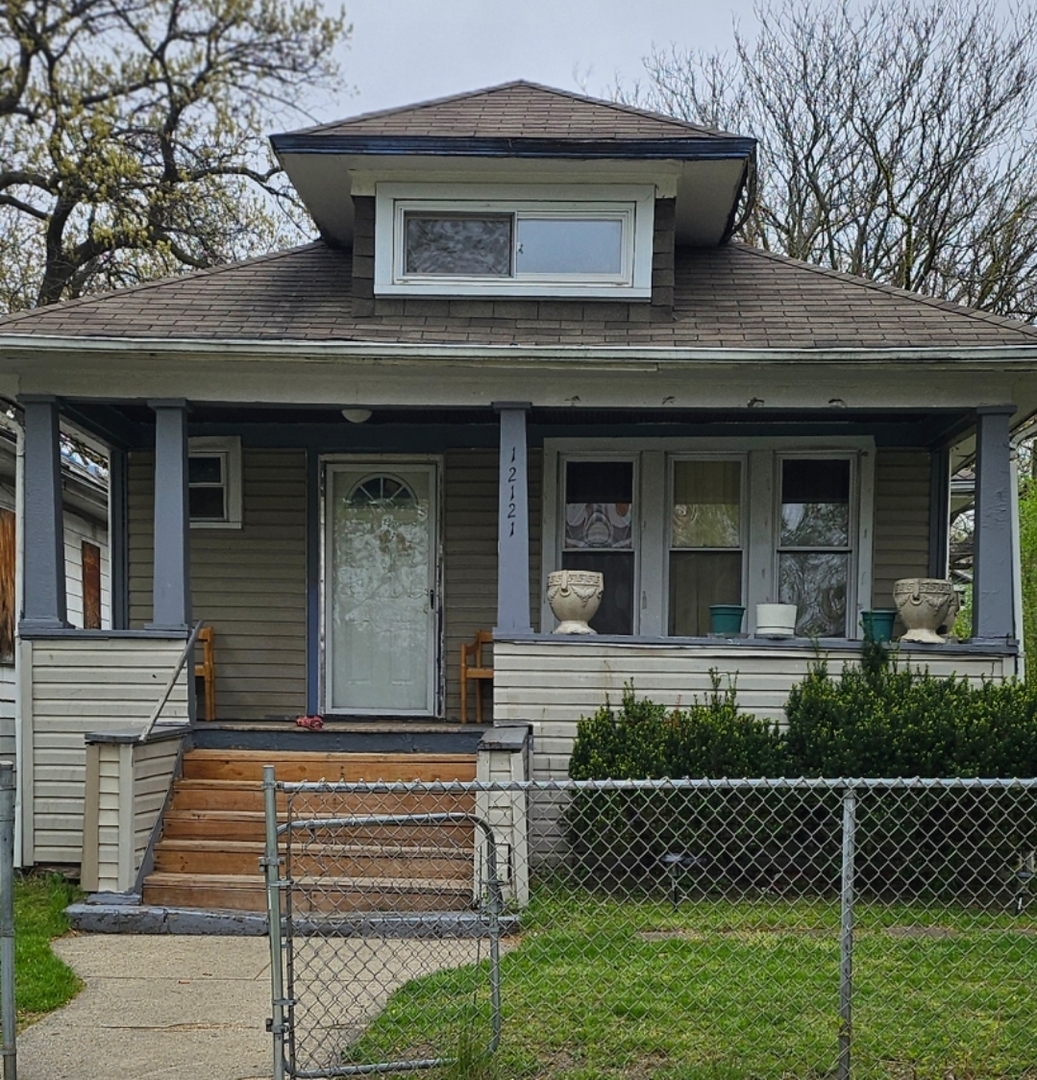 Photo 1 of 2 of 12121 S NORMAL Avenue house