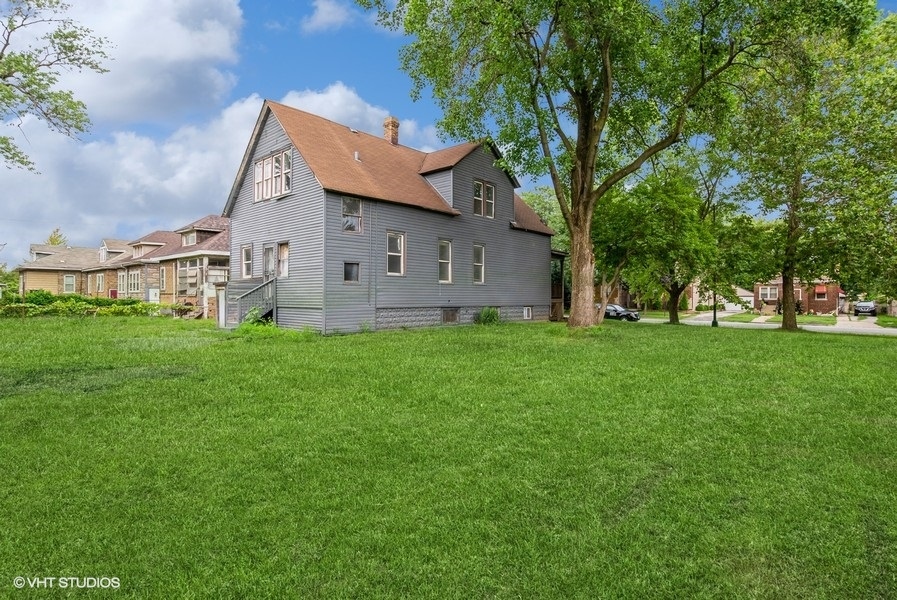 Photo 4 of 24 of 12420 S State Street house