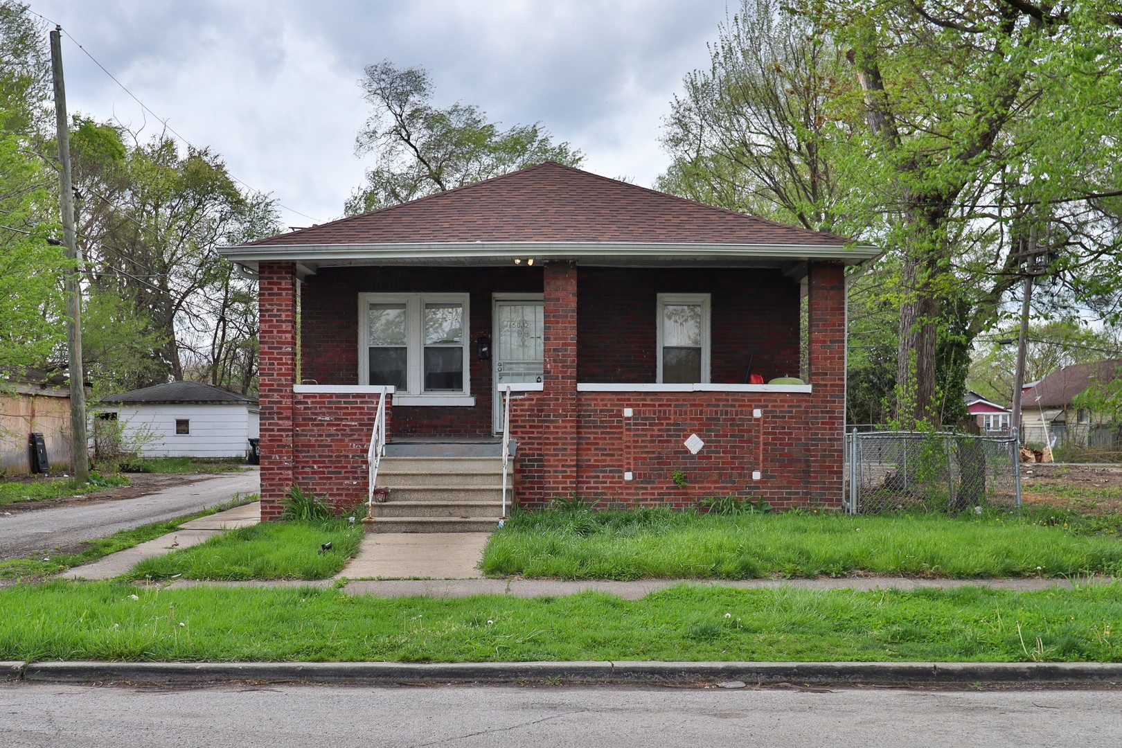 Photo 1 of 51 of 15032 Marshfield Avenue house