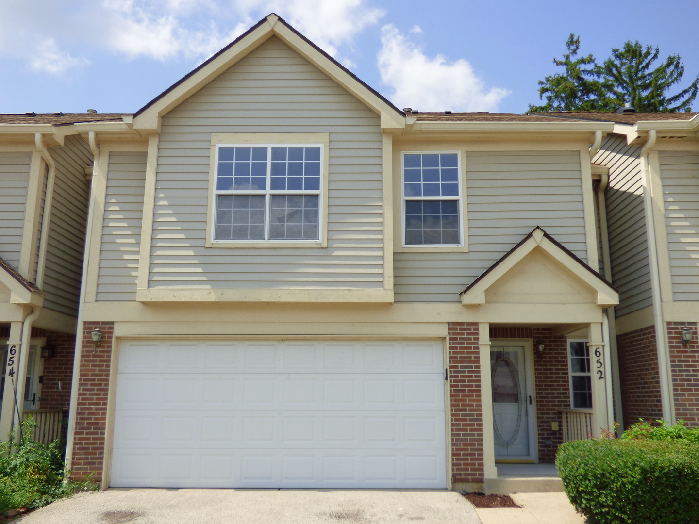 Photo 1 of 21 of 652 Whispering Oaks Court townhome