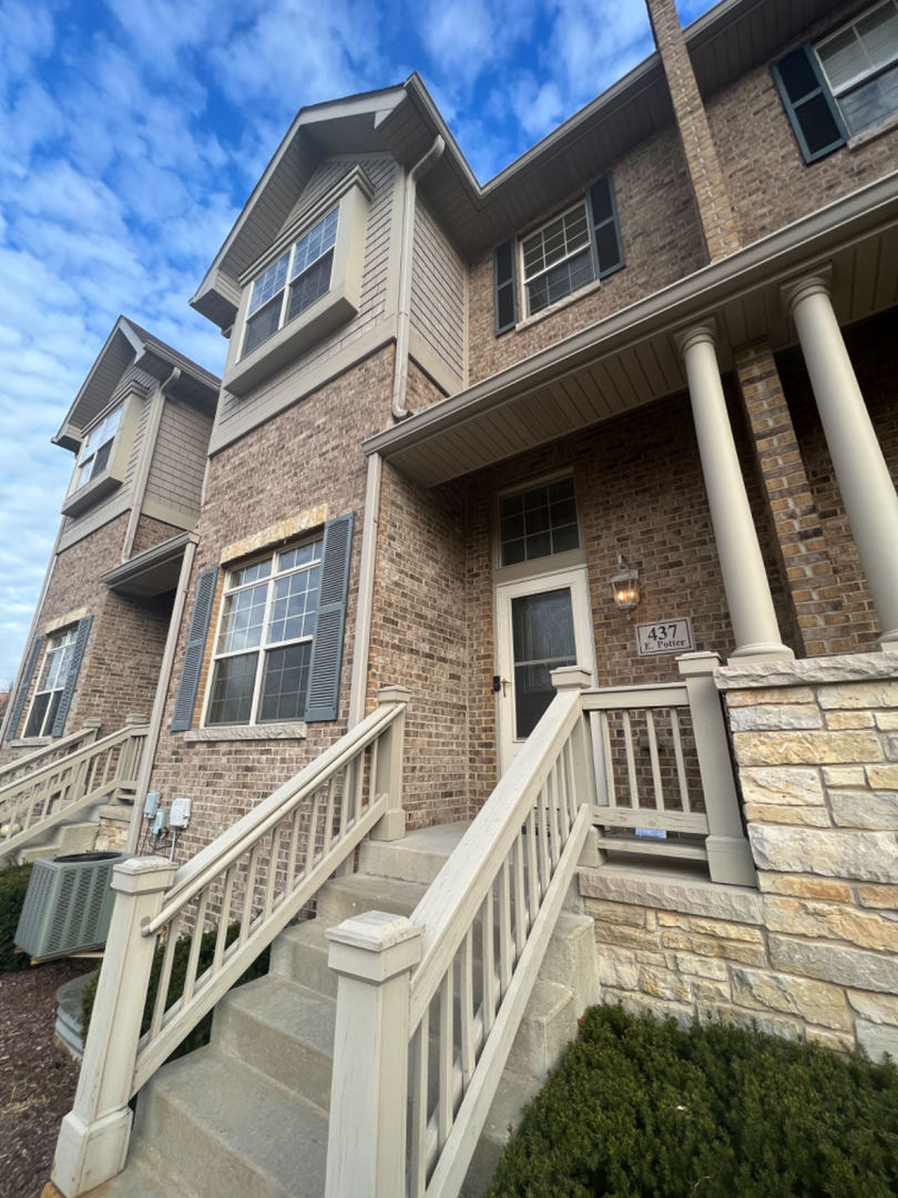 Photo 1 of 14 of 437 E Potter Street townhome