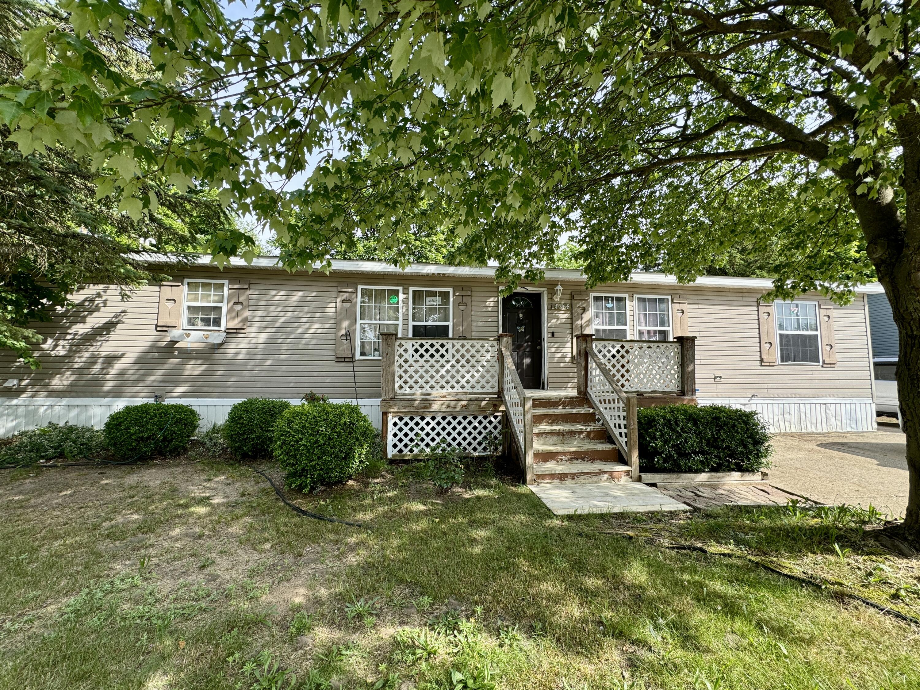 Photo 1 of 43 of 14368 Winding Creek Lane mobile home