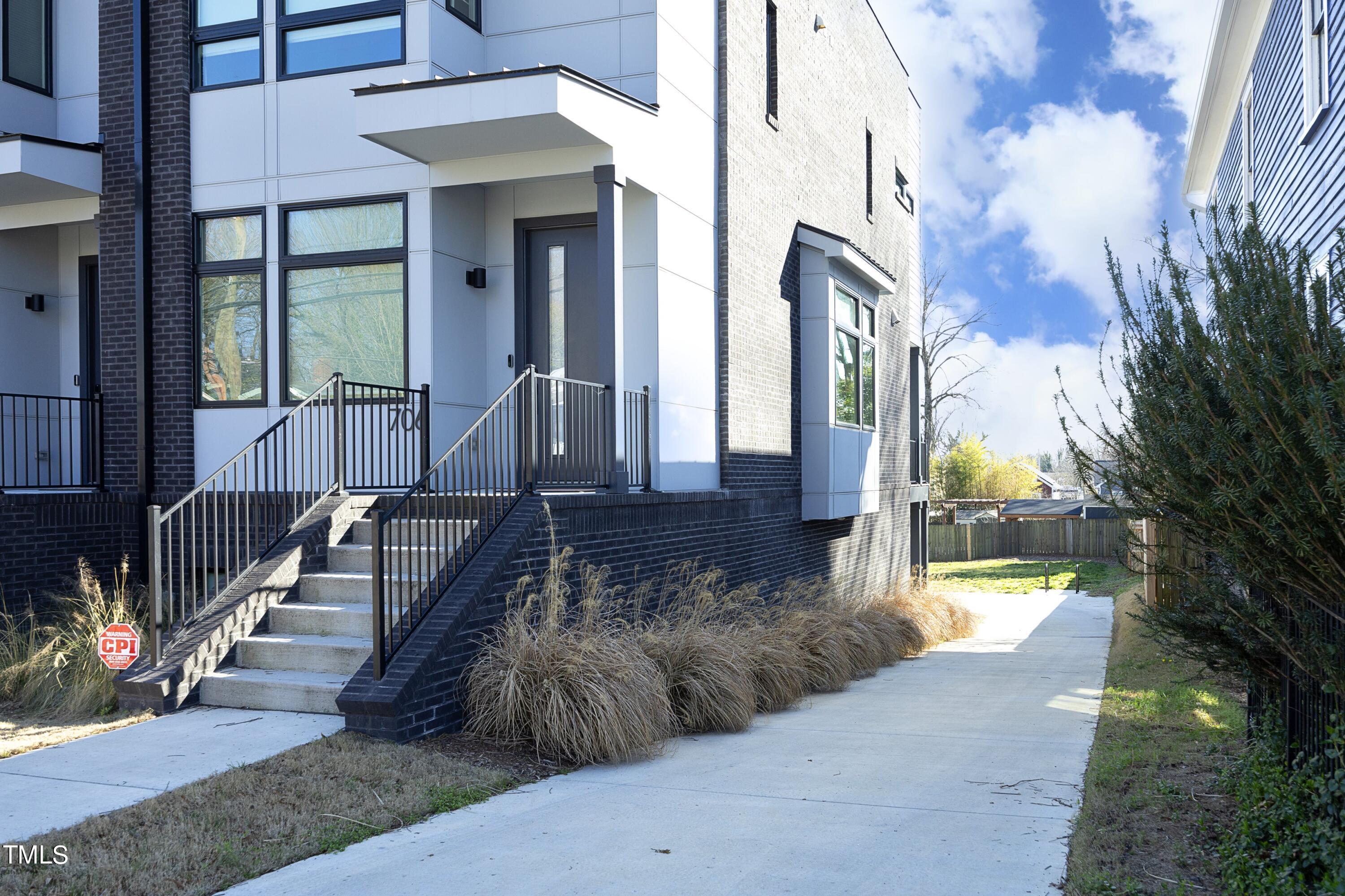 Photo 2 of 36 of 706 E Hargett Street townhome