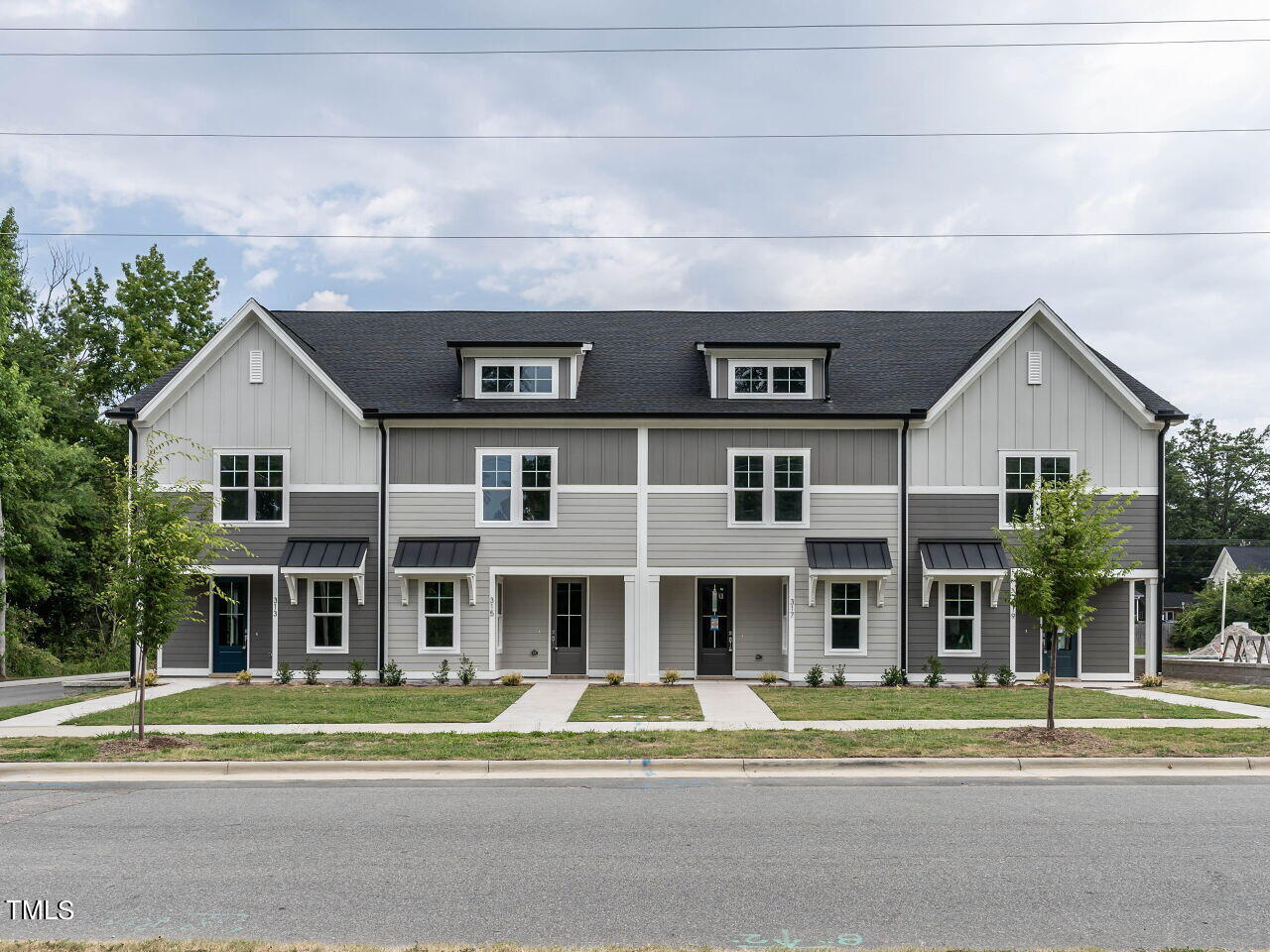 Photo 1 of 25 of 317 E Fourth Street townhome