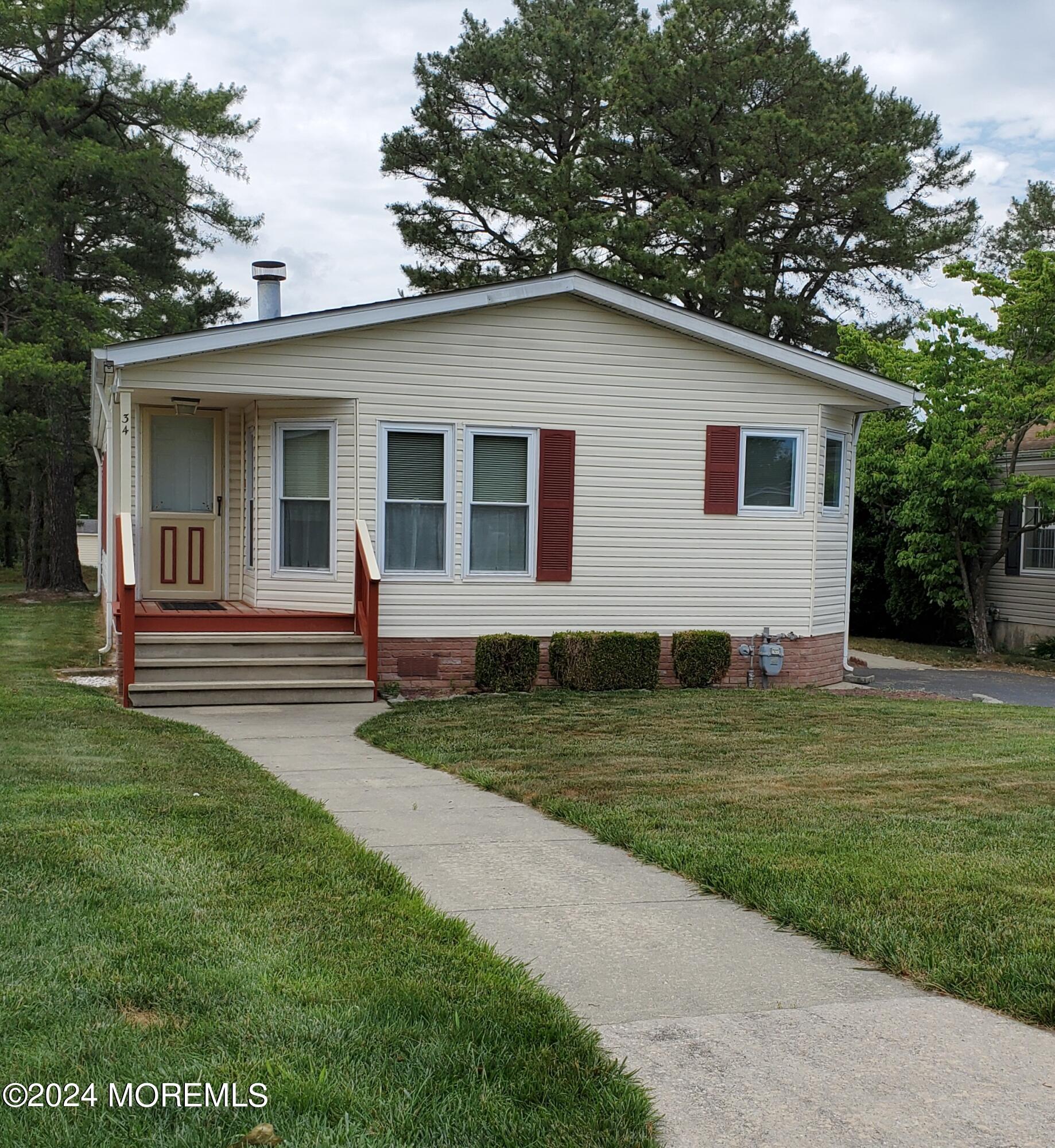 Photo 2 of 8 of 34 Pine Ridge Boulevard house